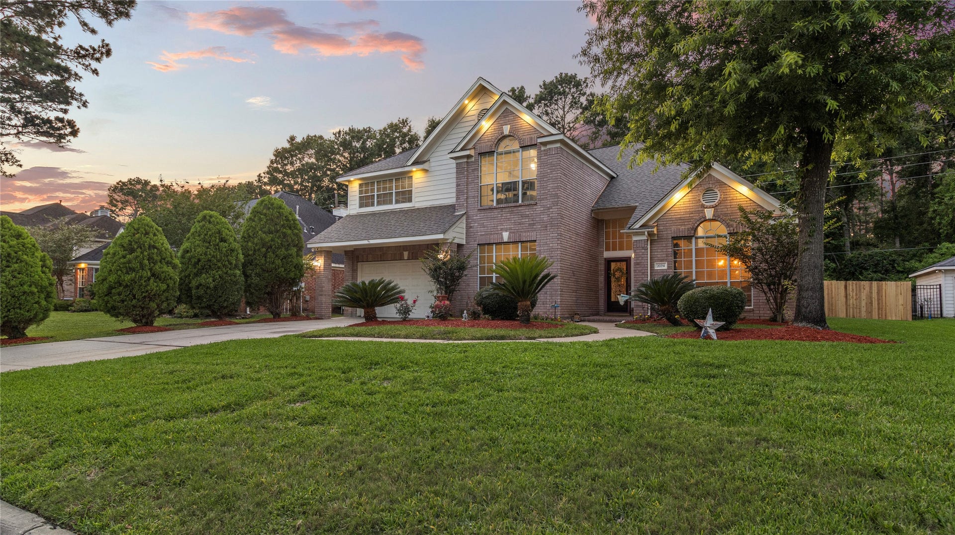 20214 Powerscourt Drive, Humble, TX 77346 The side-profile view emphasizes the deep lot and the convenient access to the spacious two-car garage