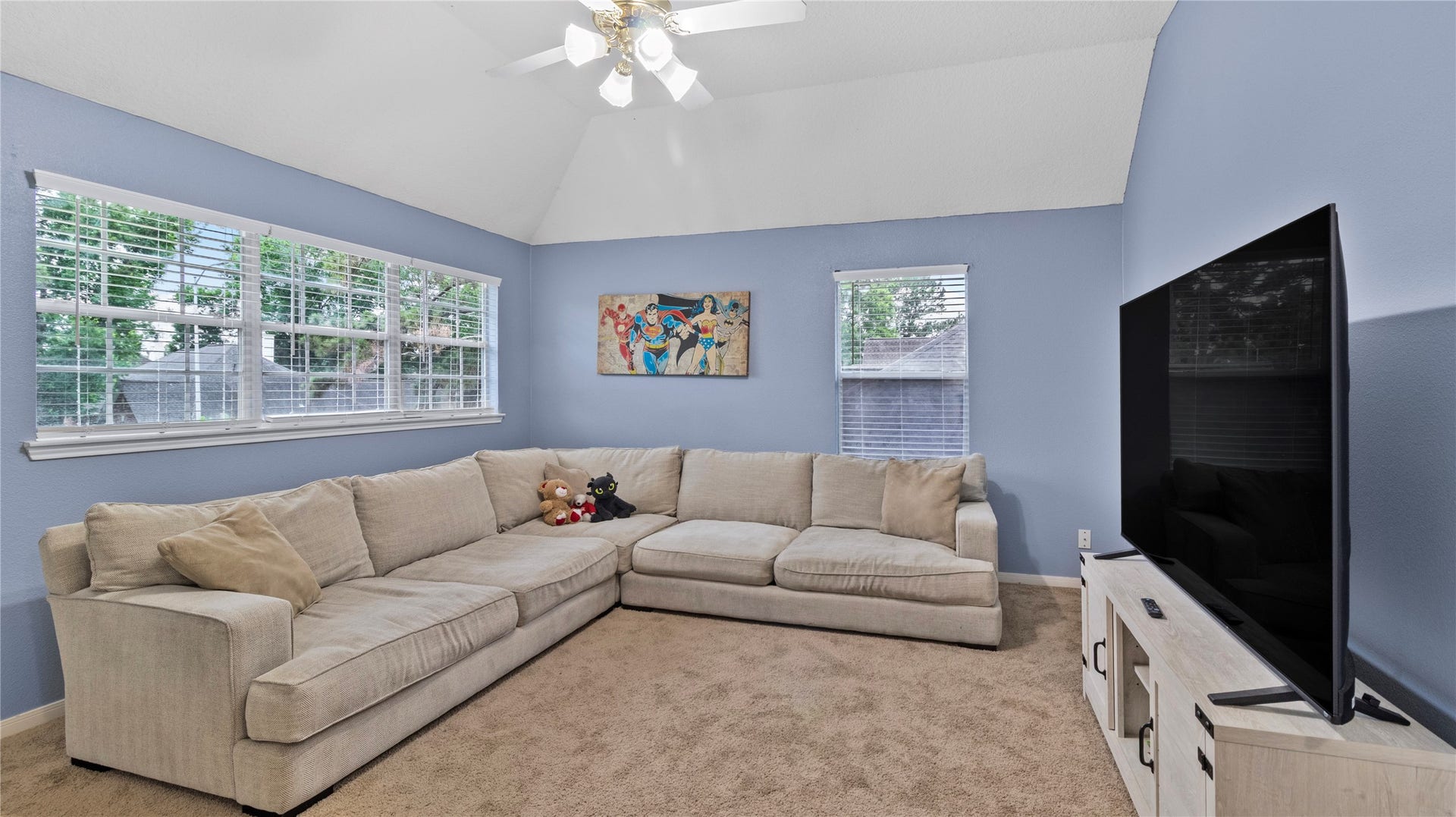 20214 Powerscourt Drive, Humble, TX 77346 The expansive second-floor landing serves as a versatile bonus room, filled with natural light and ideal for family movie nights