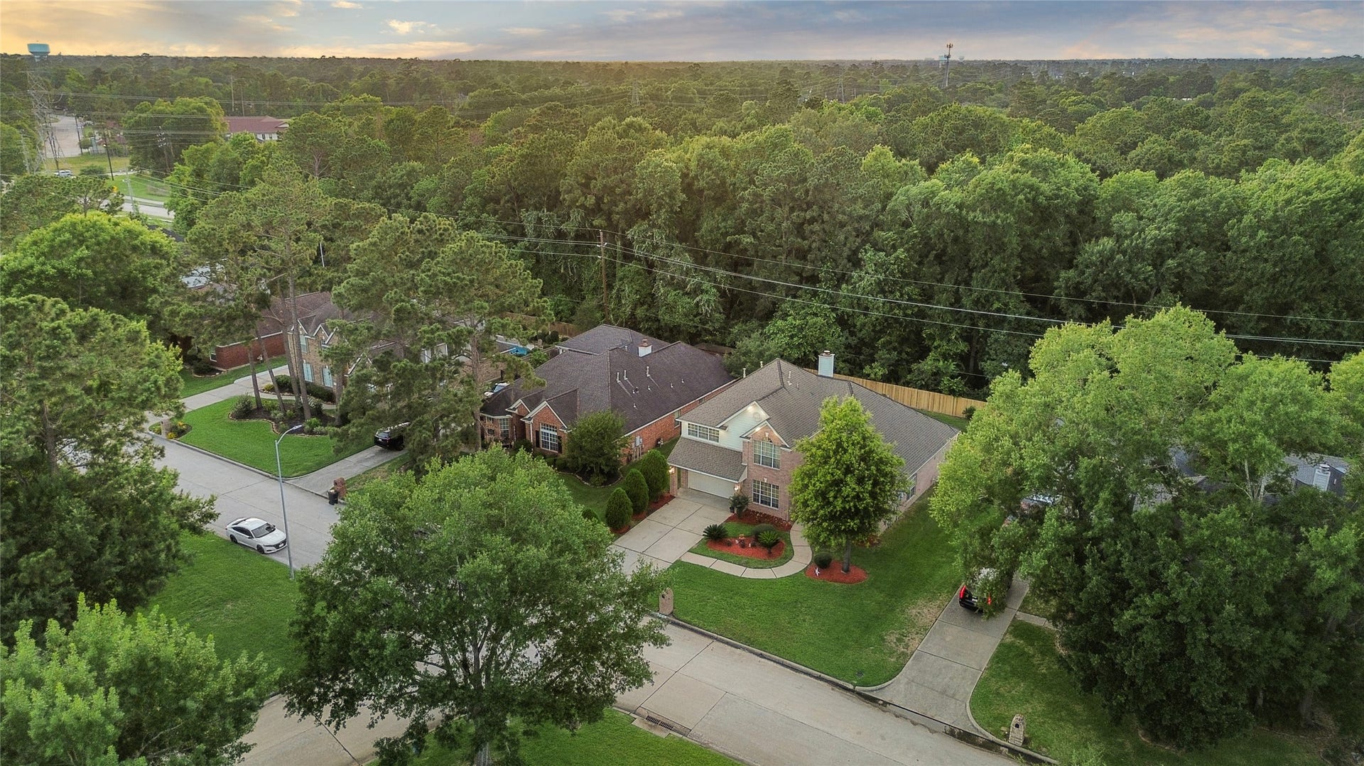 20214 Powerscourt Drive, Humble, TX 77346 Enjoy ultimate privacy with this stunning property that backs into a lush, dense wooded areano rear neighbors