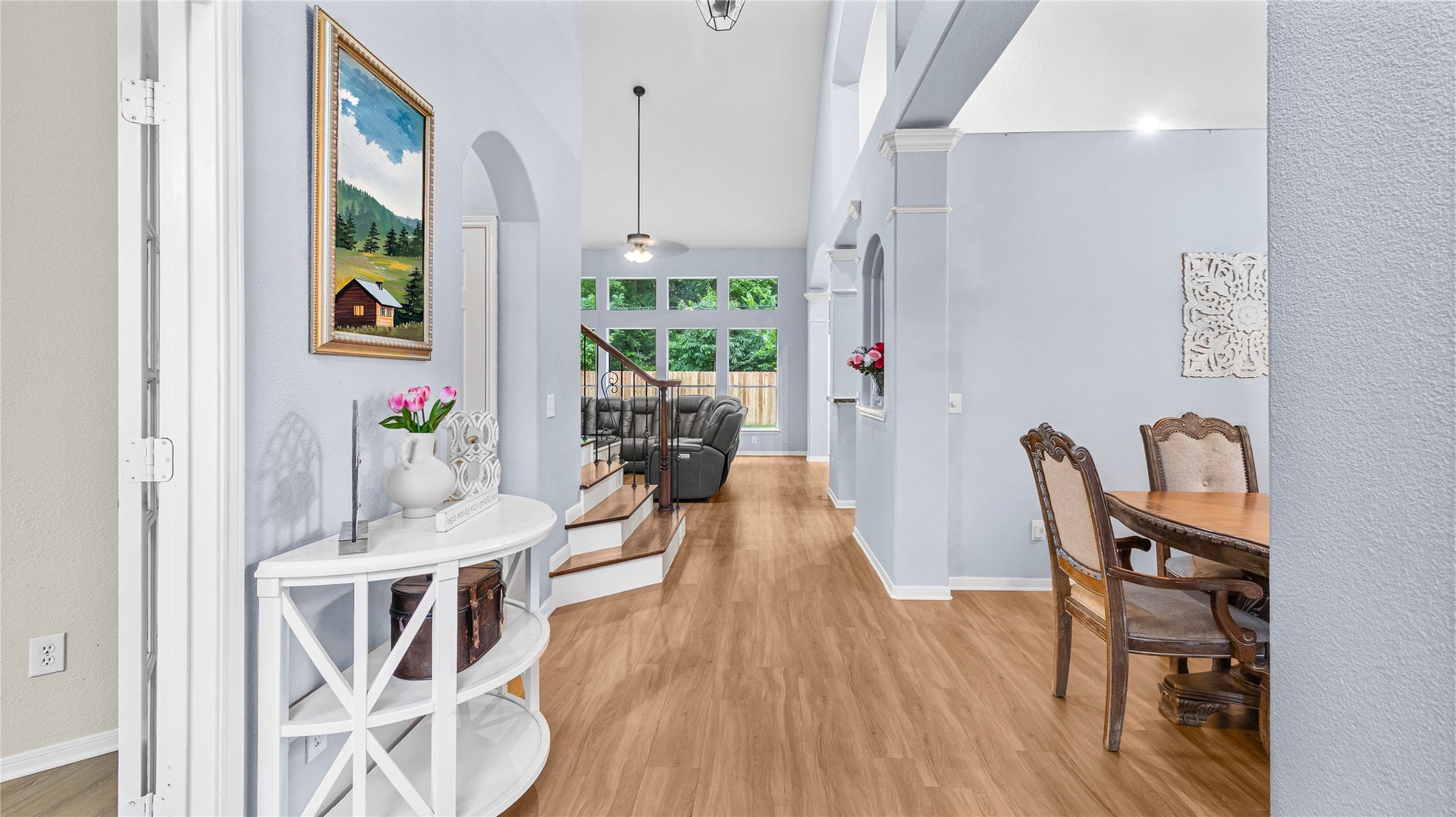20214 Powerscourt Drive, Humble, TX 77346 A welcoming first impressionthis bright foyer features soaring ceilings and elegant architectural details that set the tone for the rest of the home.