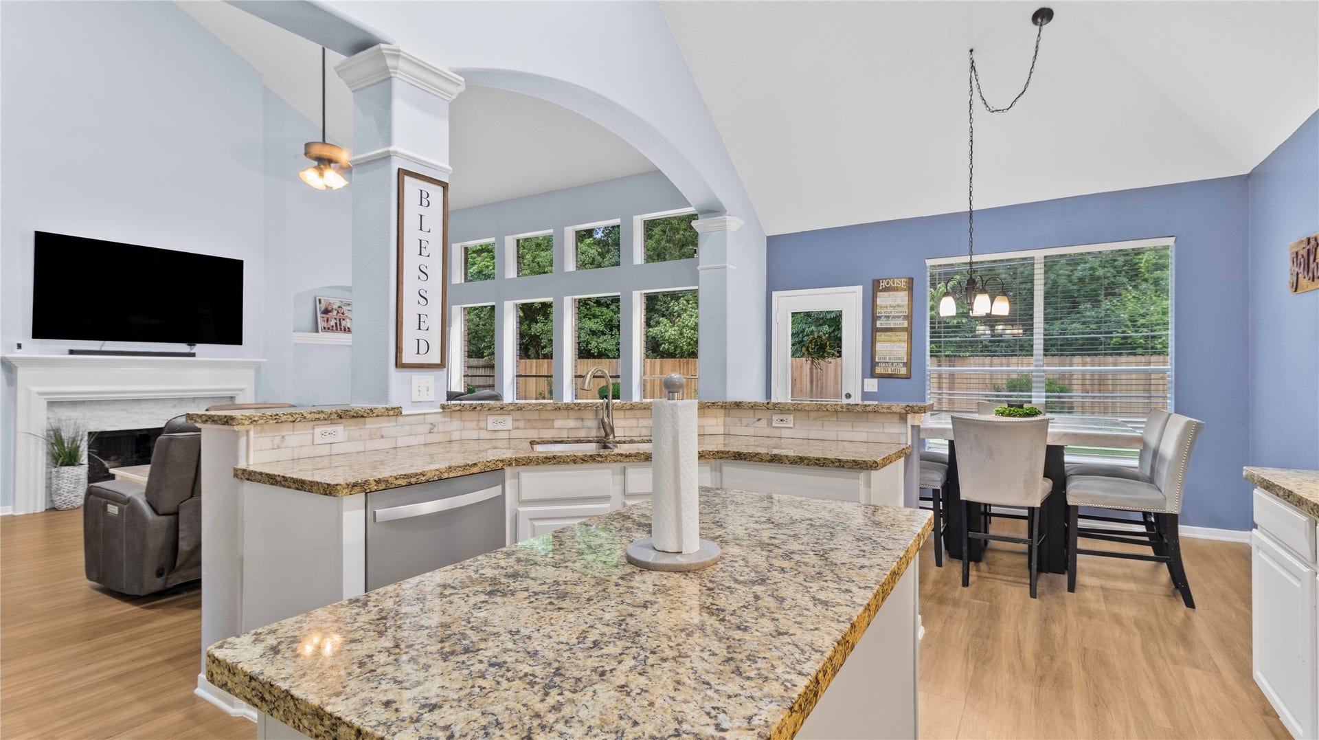 20214 Powerscourt Drive, Humble, TX 77346 The ideal layout for entertainingthis inviting open-concept space flows seamlessly from the gourmet kitchen into the dining and living areas