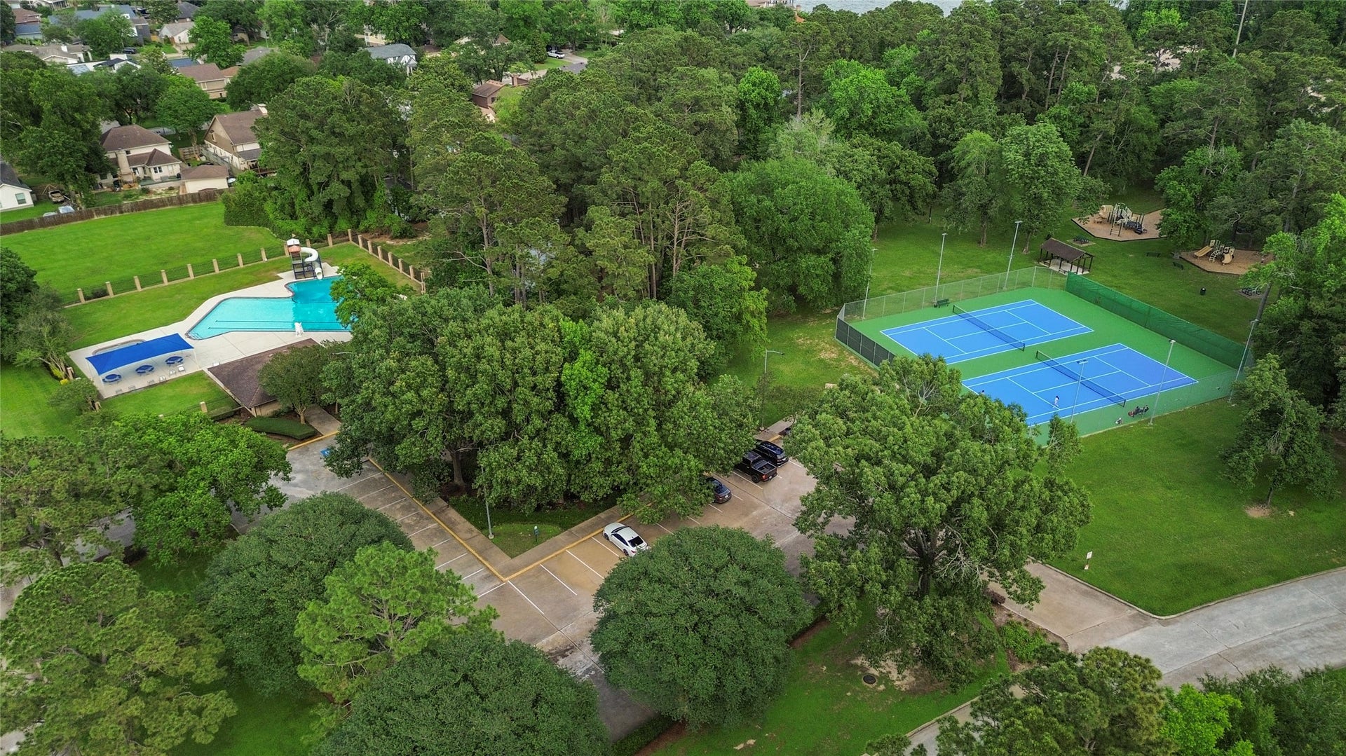 20214 Powerscourt Drive, Humble, TX 77346 Enjoy resort-style living with access to the neighborhood tennis courts and beautifully maintained recreation areas.