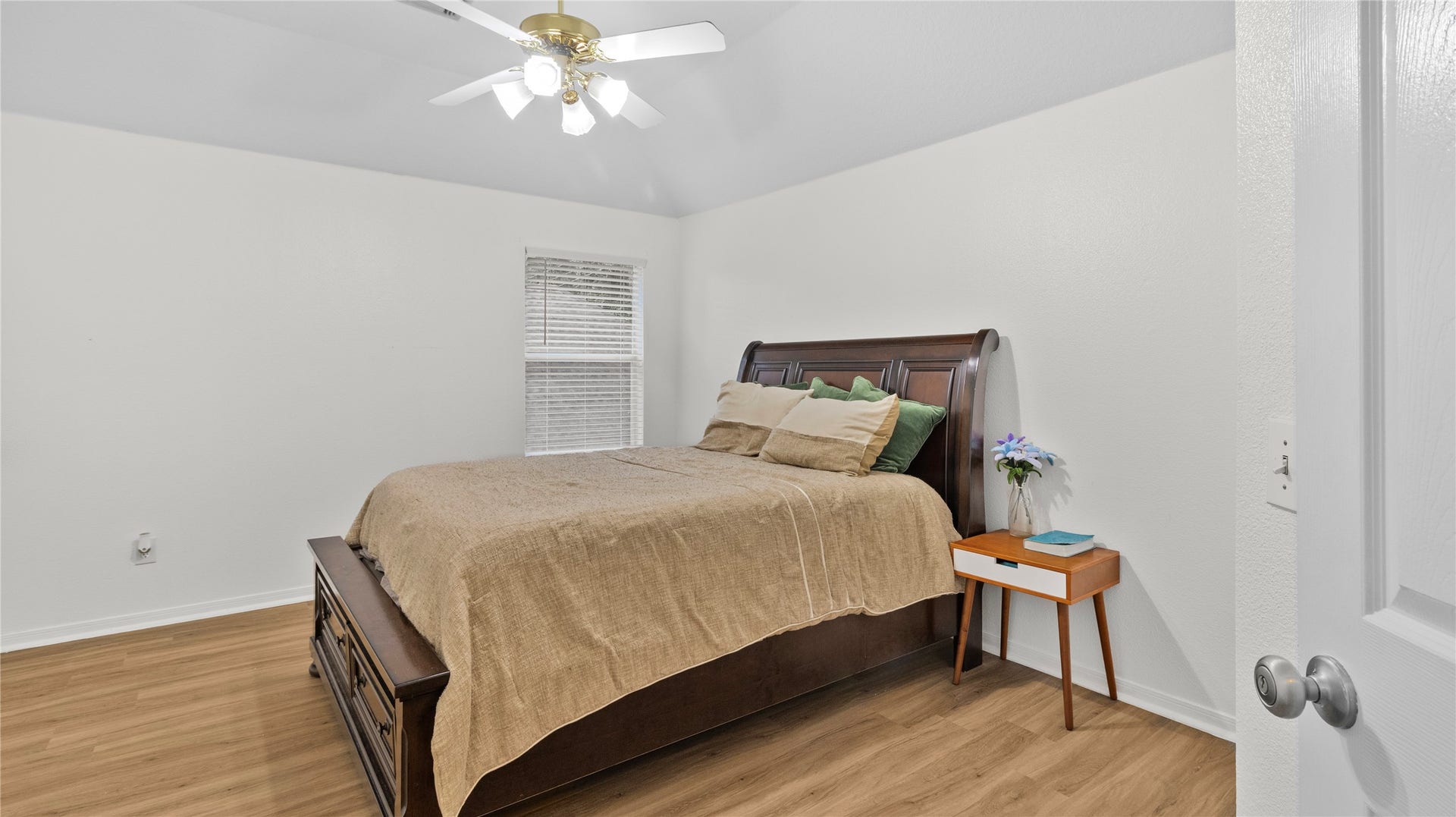 20214 Powerscourt Drive, Humble, TX 77346 A comfortable secondary bedroom with clean lines and a modern feel, ready to be personalized to fit your needs.