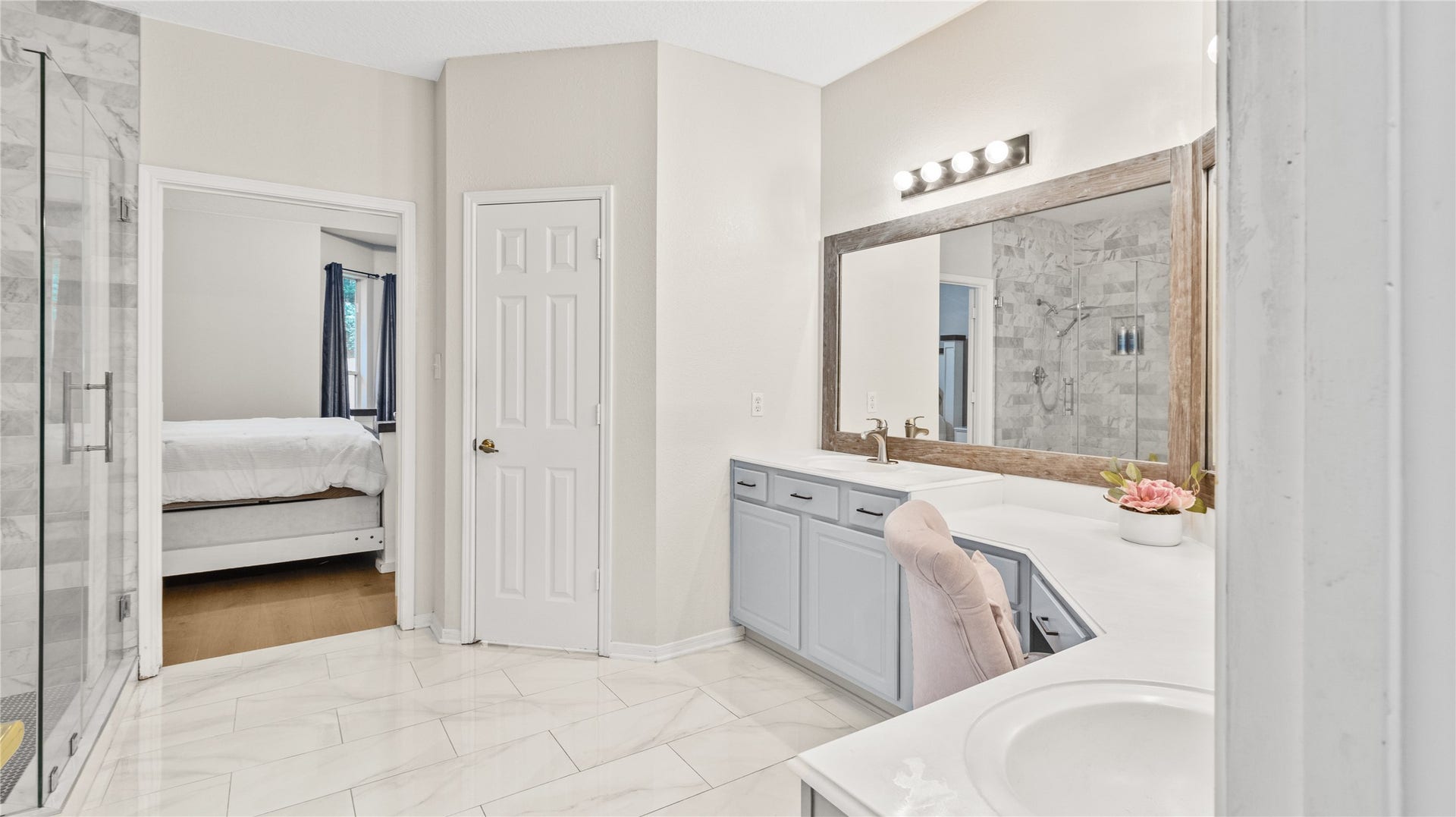 20214 Powerscourt Drive, Humble, TX 77346 he seamless flow between the primary bedroom and the ensuite highlights the homes open design and sophisticated color palette