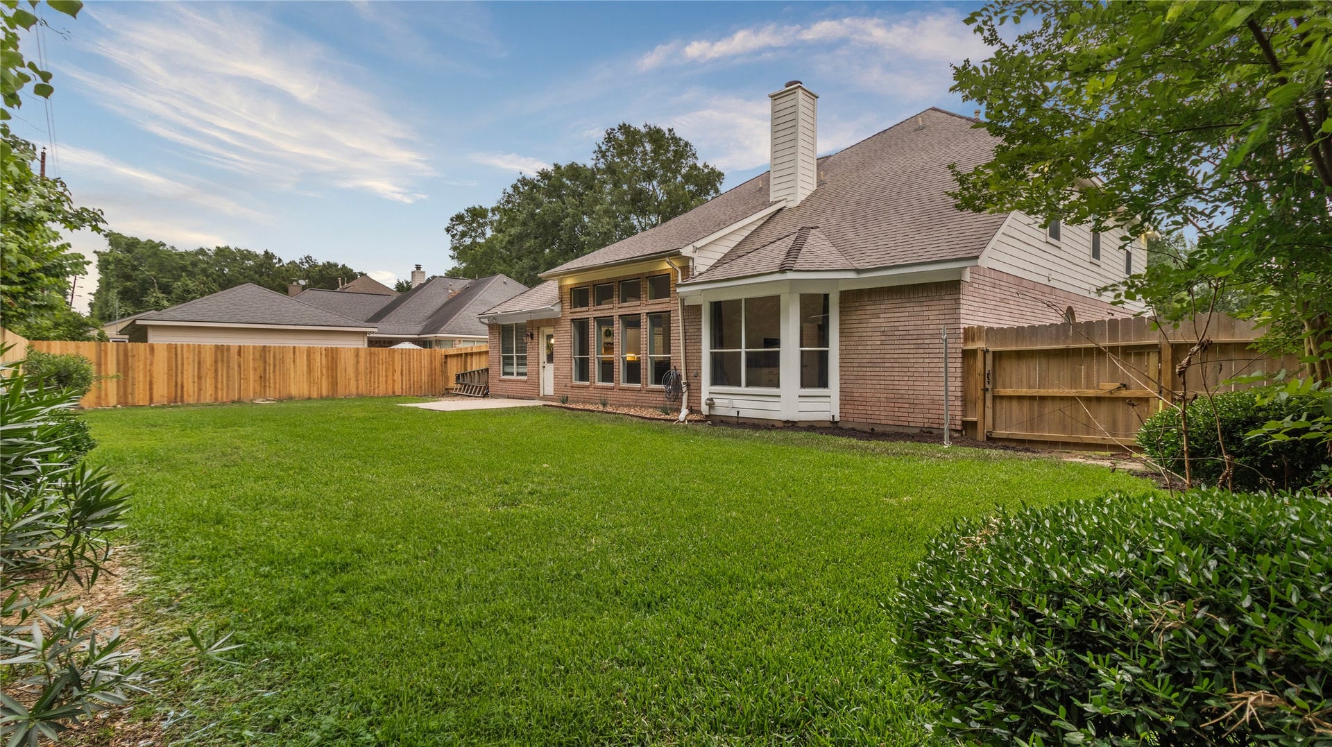 20214 Powerscourt Drive, Humble, TX 77346 The homes classic brick exterior and well-maintained roofline highlight the quality and care put into this property.