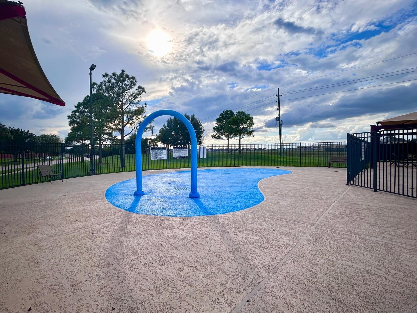 25918 Silver Timbers Lane, Katy, TX 77494 Enjoy outdoor fun with this charming splash pad area, perfect for sunny days and surrounded by a secure fence. Ideal for family gatherings and relaxation.