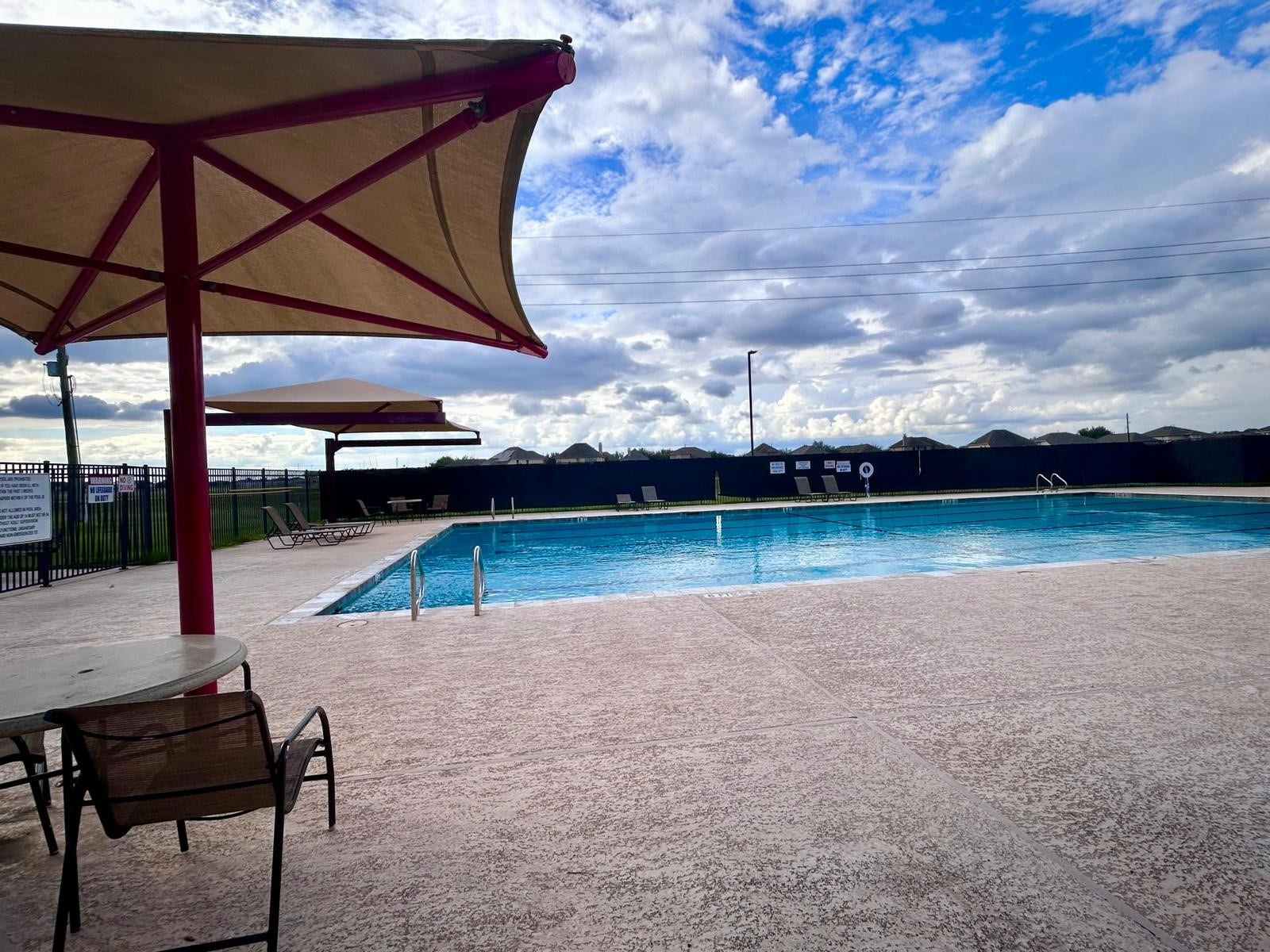 25918 Silver Timbers Lane, Katy, TX 77494 Enjoy leisurely days by the spacious community pool, complete with shaded seating areas and a serene atmosphere perfect for relaxation.