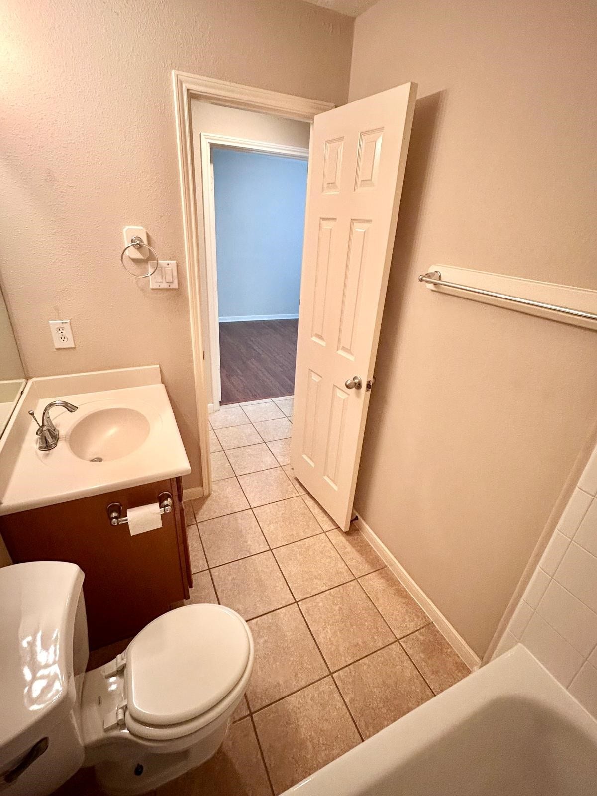 25918 Silver Timbers Lane, Katy, TX 77494 Cozy bathroom with a sleek vanity, tiled flooring, and easy access to an adjacent room.