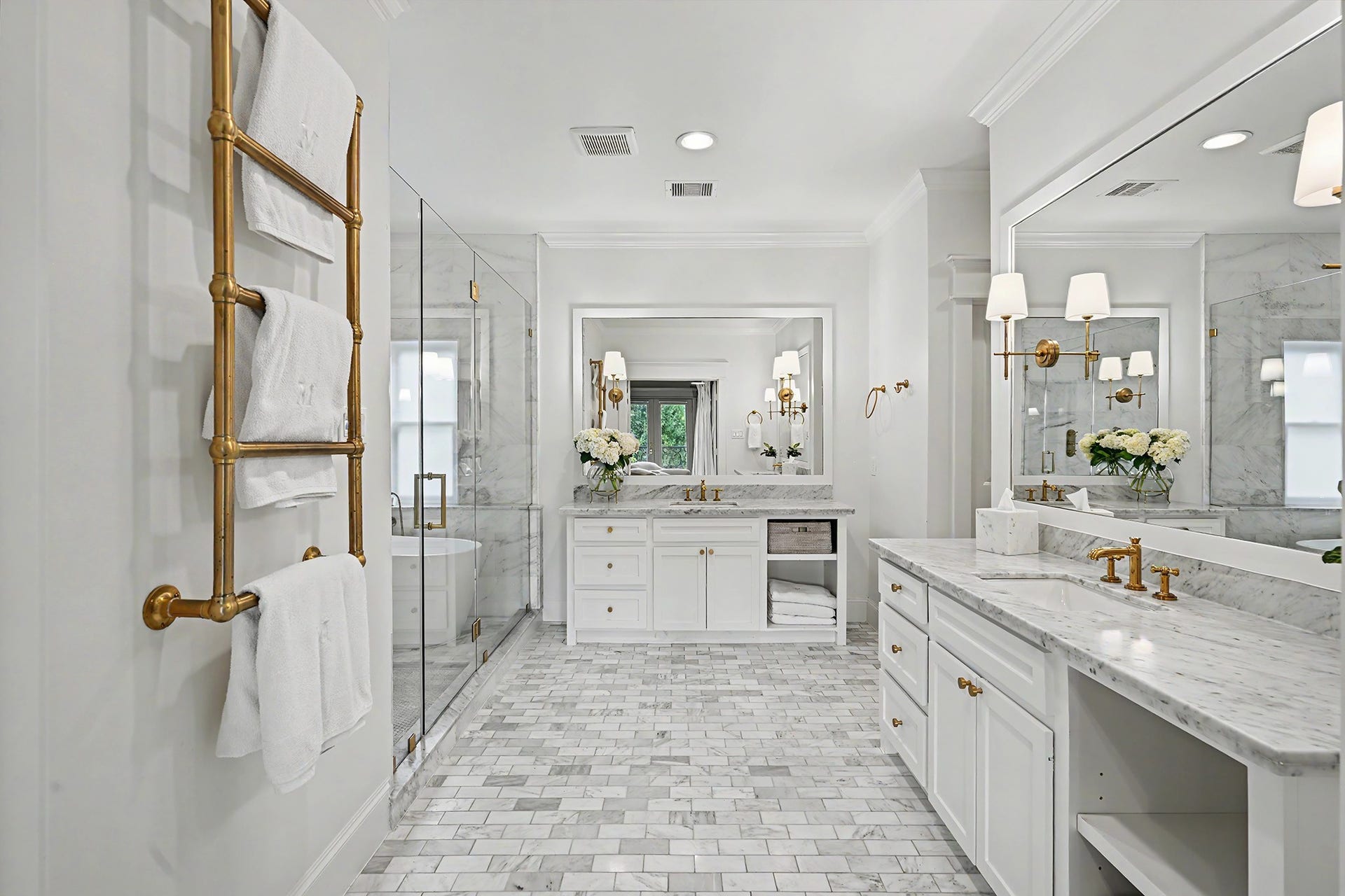 504 W 10th Street, Houston, TX 77008 Double doors open into the spa-like primary bathroom which boasts marble counters, double sinks, wet room, marble floors and towel warmer.