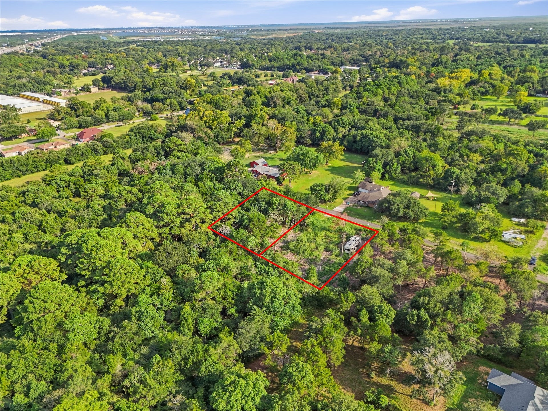 Lot 12 & 13 Moss St, La Marque, TX 77568 Wooded setting offering privacy with room to create your vision.