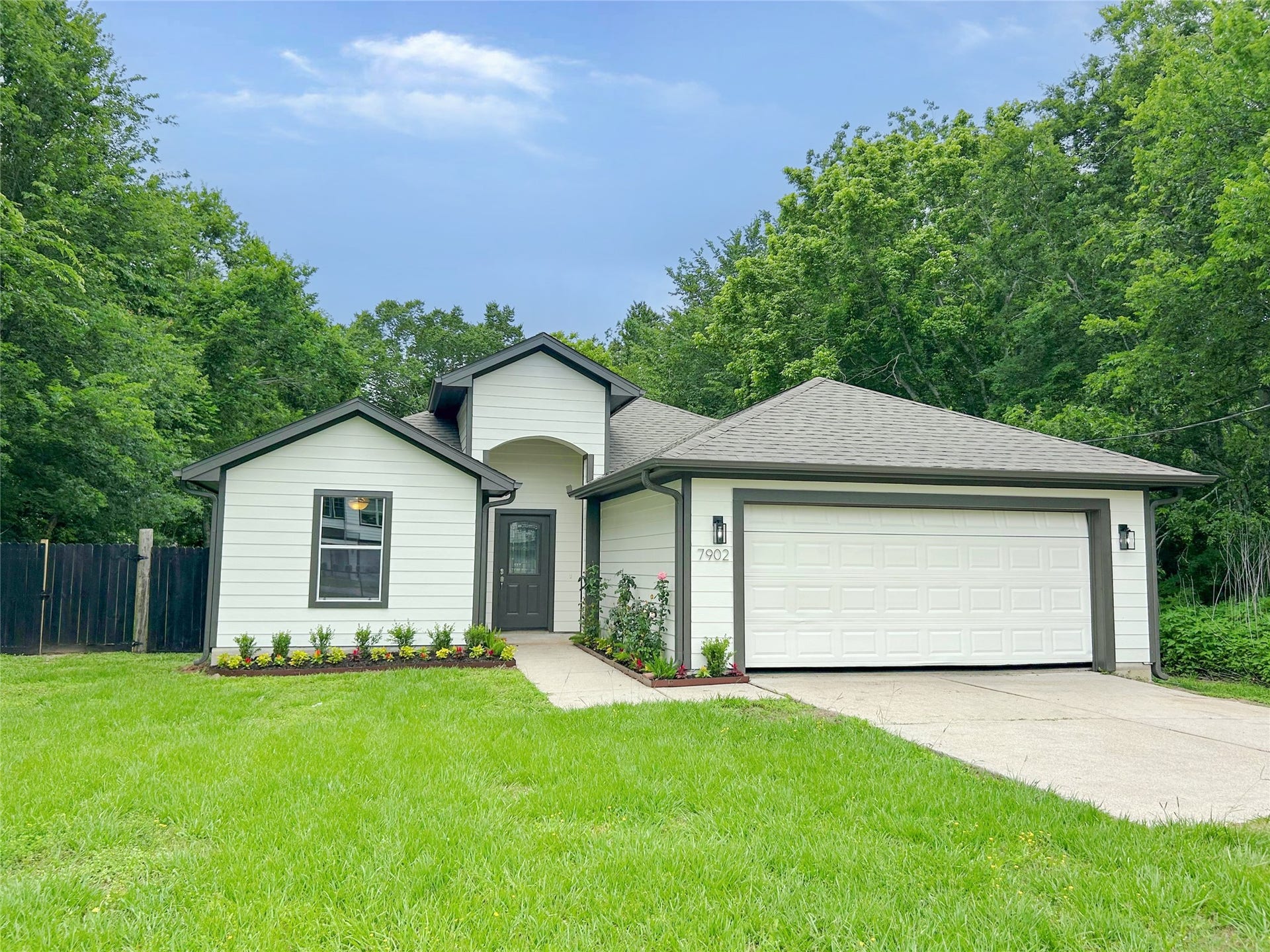 Look at this beautiful exterior design. The exterior features new exterior paint, a new roof and updated landscaping.