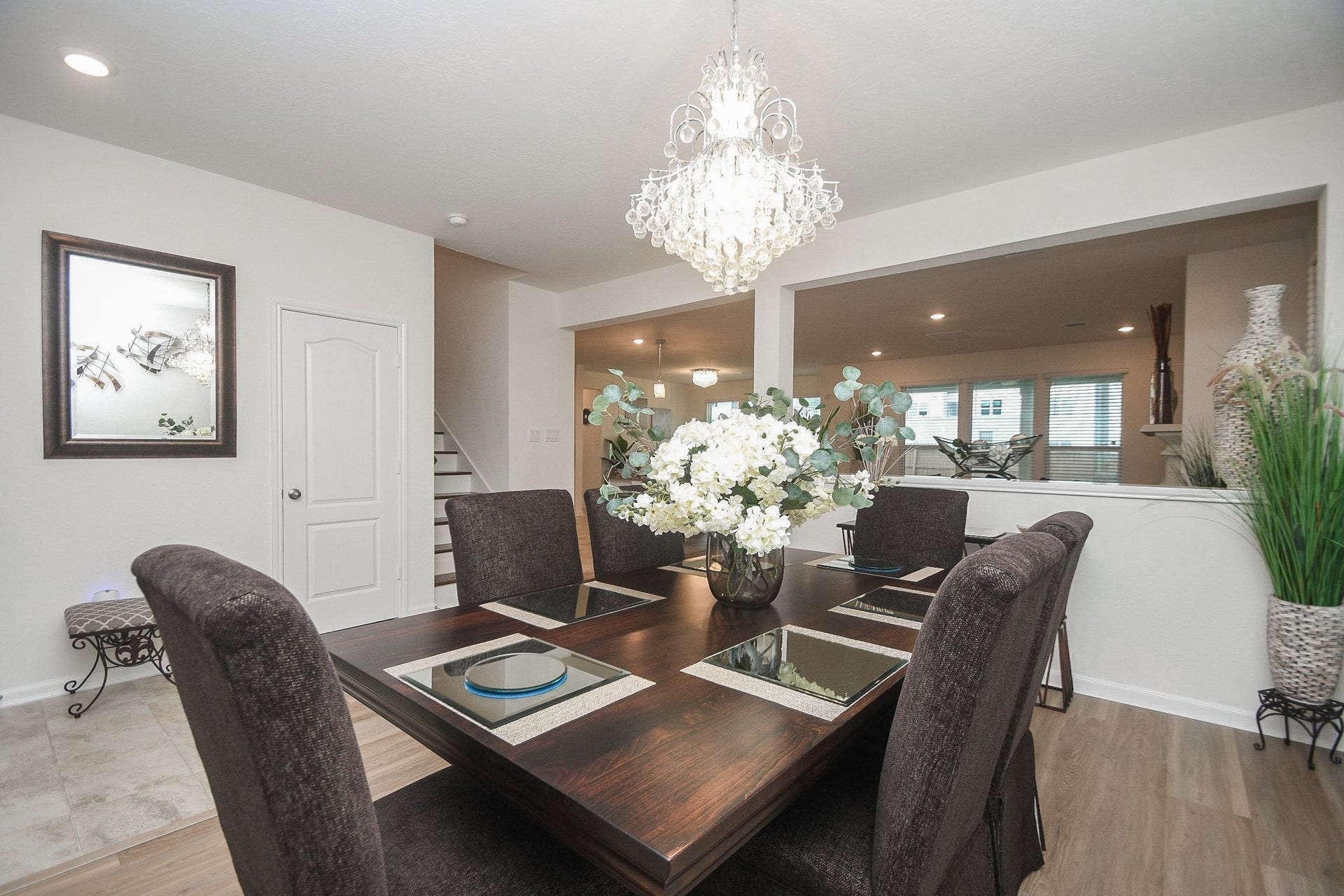 22523 Strathmore Drive, Richmond, TX 77469 An inviting open concept living area with a modern and airy feel from the dining area.