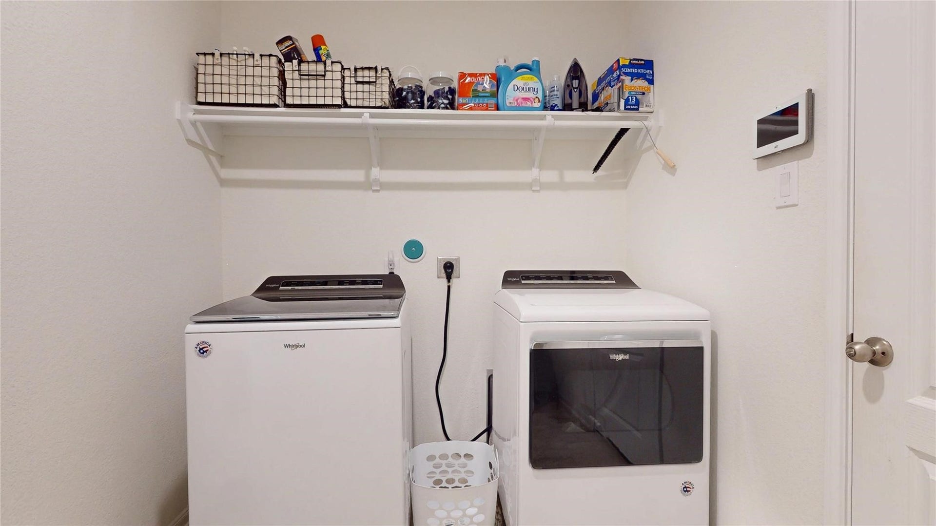 22523 Strathmore Drive, Richmond, TX 77469 This convenient utility closet easily hides (and is very accessible) with handy storage space, above. Washer and Dryer does not stay.