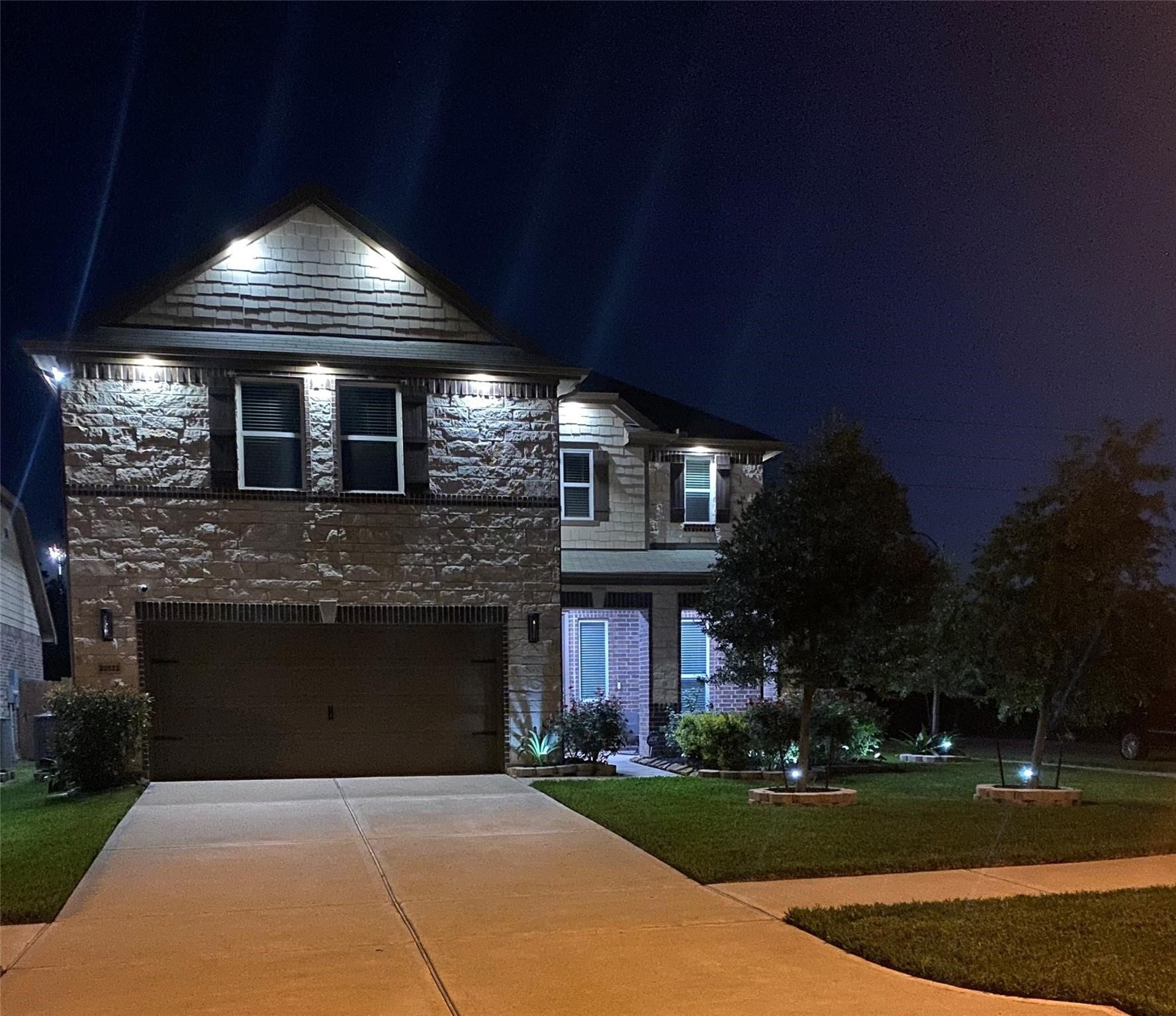 22523 Strathmore Drive, Richmond, TX 77469 Look how bright the house and driveway are with all the night lights!