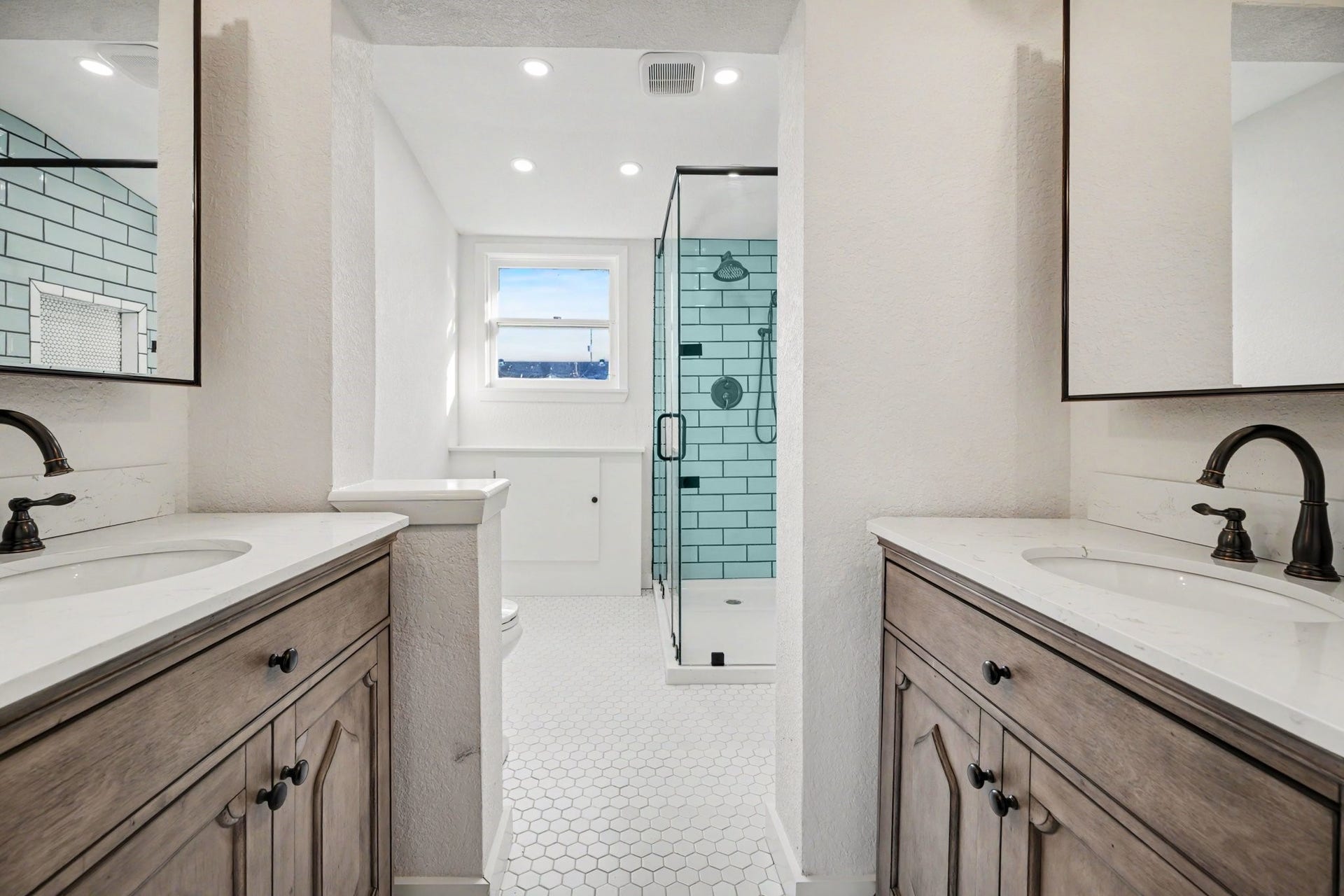 Completely updated primary bathroom en suite with double sinks