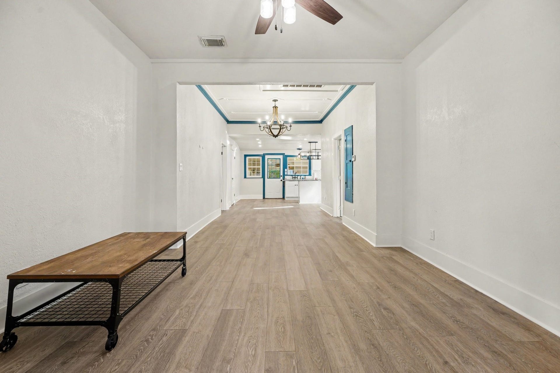 Living room dining view with updated LVP flooring