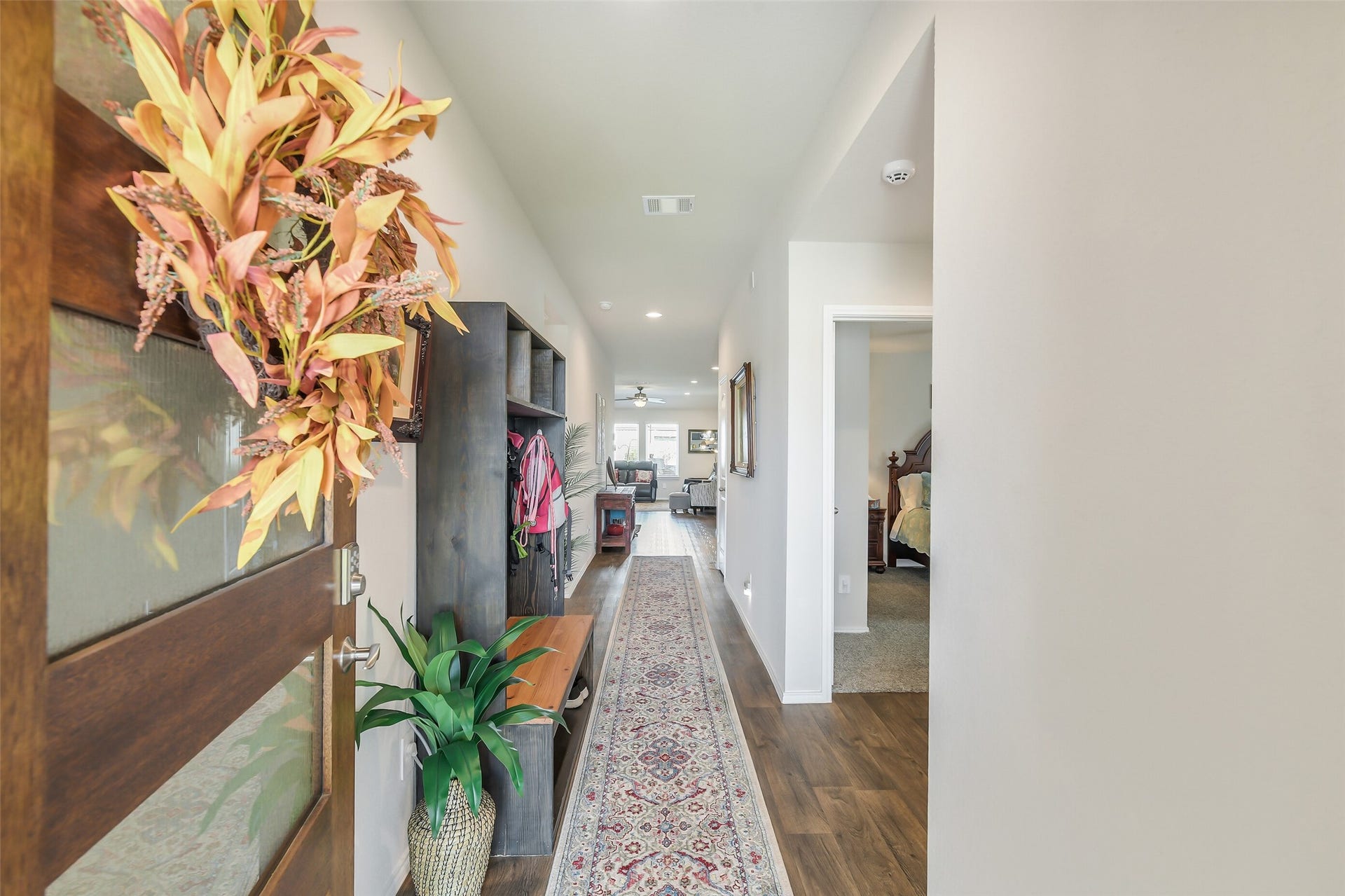 21225 Ivy Woods Court, New Caney, TX 77357 Long entry and high ceilings give you a welcoming feeling the minute you walk in.