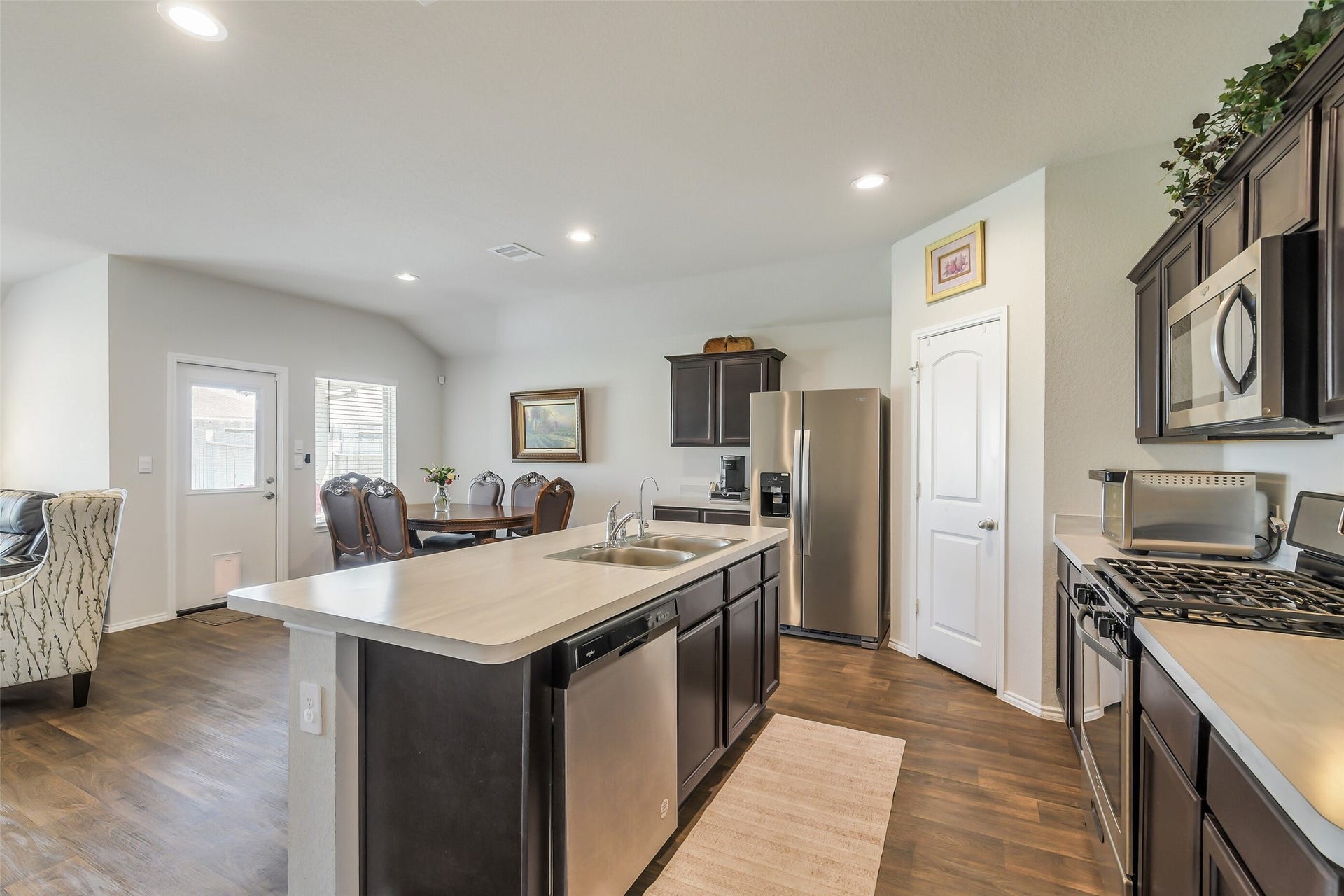 21225 Ivy Woods Court, New Caney, TX 77357 A view of the kitchen showing the dining area.