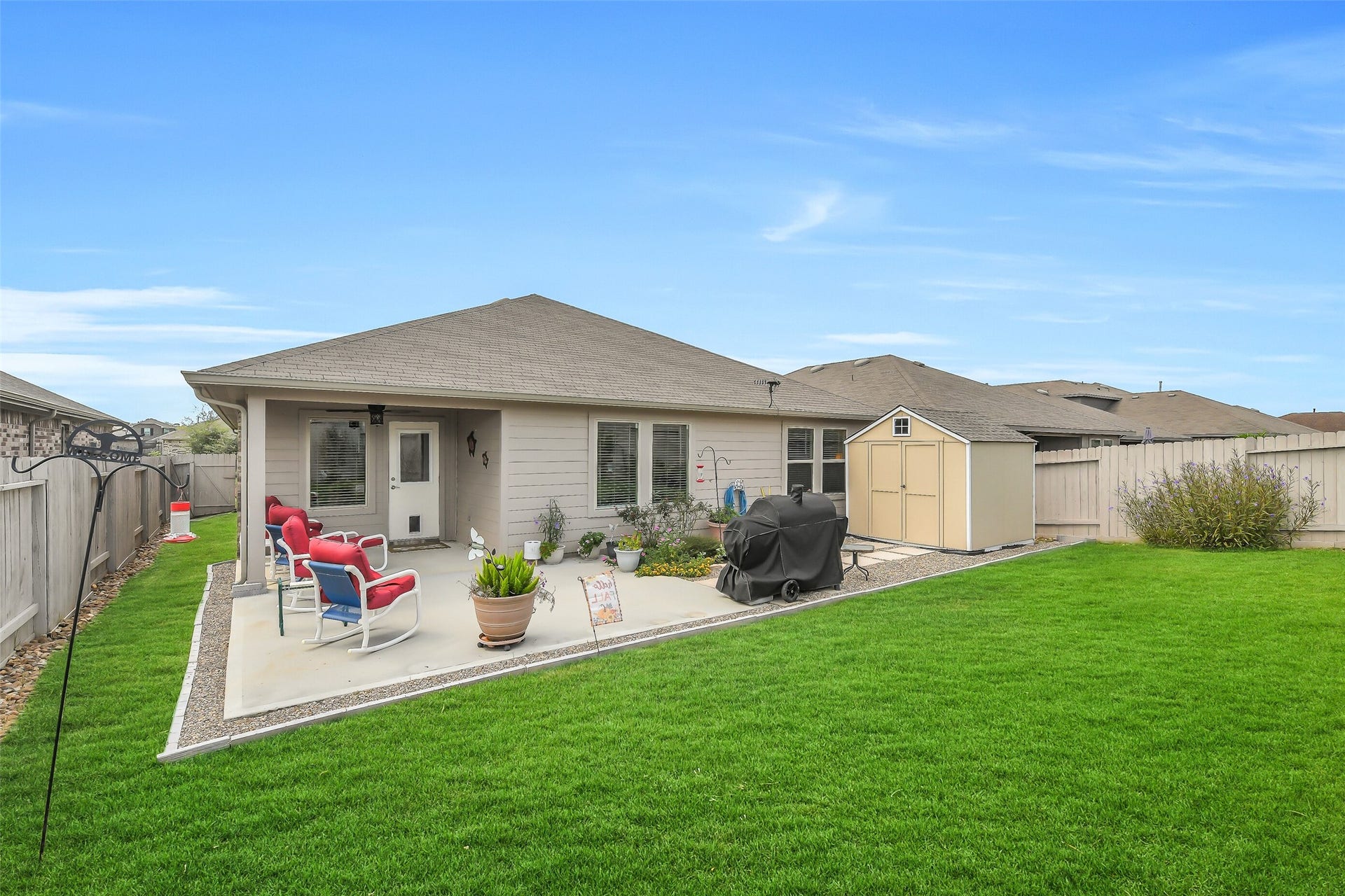 21225 Ivy Woods Court, New Caney, TX 77357 Great backyard space. Extended patio area and new shed. Nice, covered area as well as uncovered area.