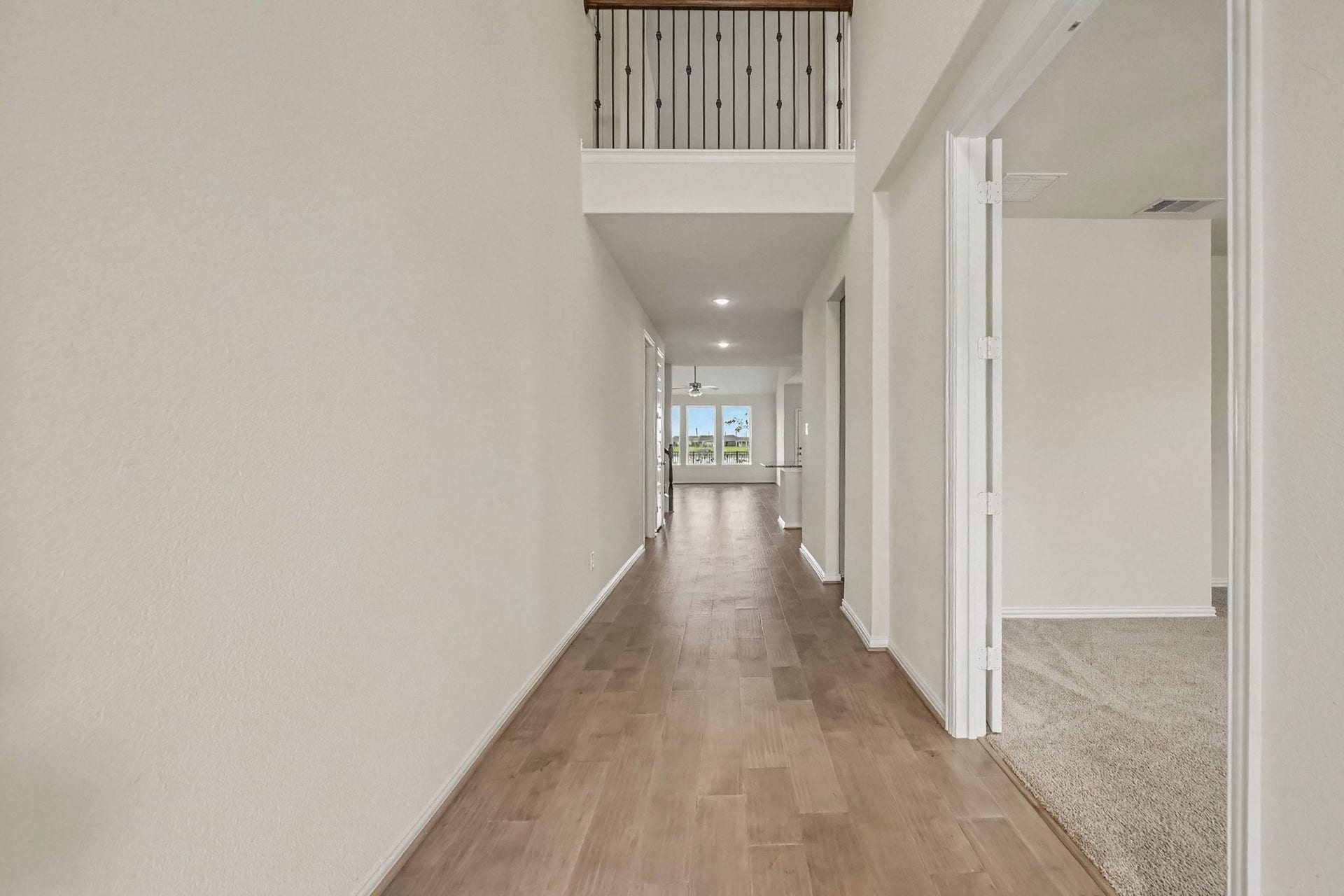 Front entry with two story ceiling