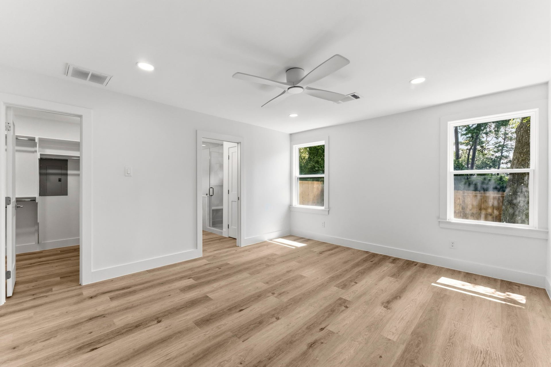 76 Woodhaven Wood Drive, The Woodlands, TX 77380 Wake up to a bright, peaceful retreat where oversized windows invite in natural light and the generous layout provides plenty of room to create your own private sanctuary.