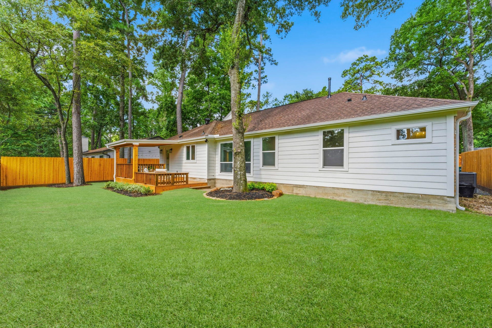 76 Woodhaven Wood Drive, The Woodlands, TX 77380 The expansive backyard offers endless possibilities, with plenty of room to add a custom pool, outdoor kitchen, or play area.