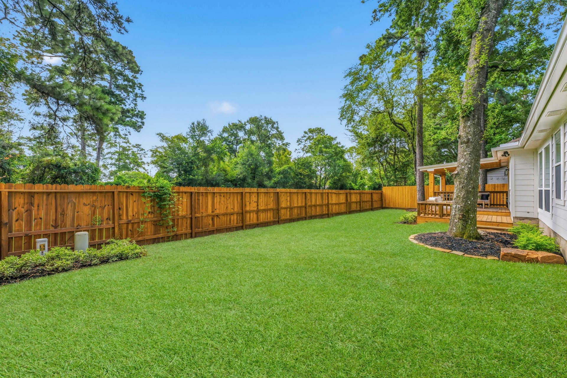 76 Woodhaven Wood Drive, The Woodlands, TX 77380 Enjoy the privacy of the backyard with all-new fencing.
