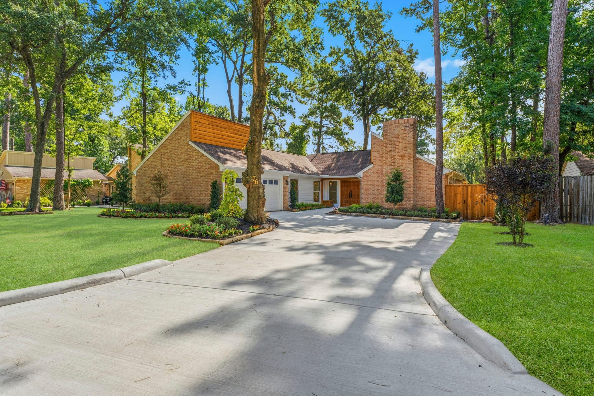 76 Woodhaven Wood Drive, The Woodlands, TX 77380 Welcome home to this beautifully reimagined residence nestled beneath mature trees in the highly desirable front of The Woodlands.