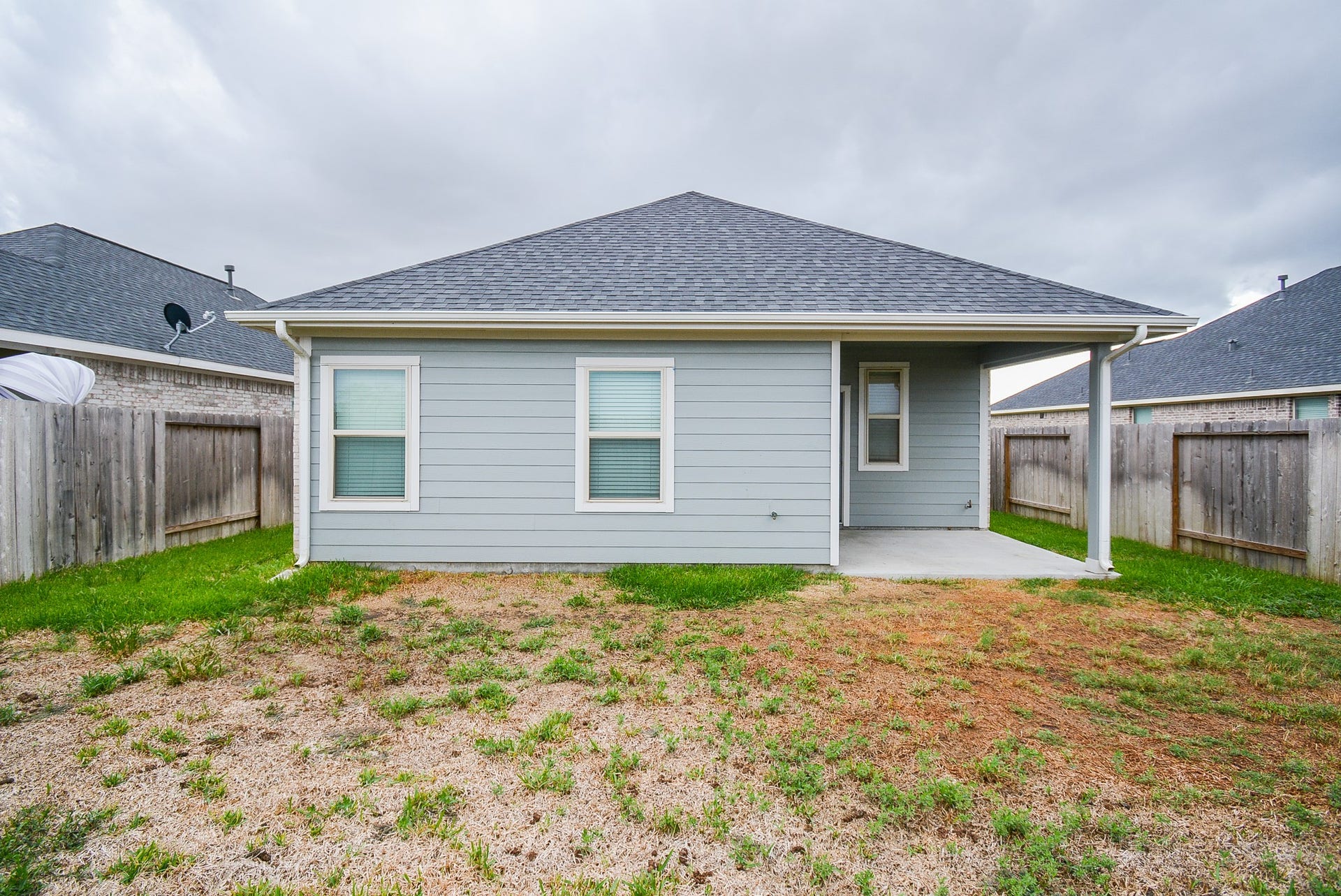 7450 French Quarter Court, Fulshear, TX 77441 Note privacy fencing all around the backyard area.