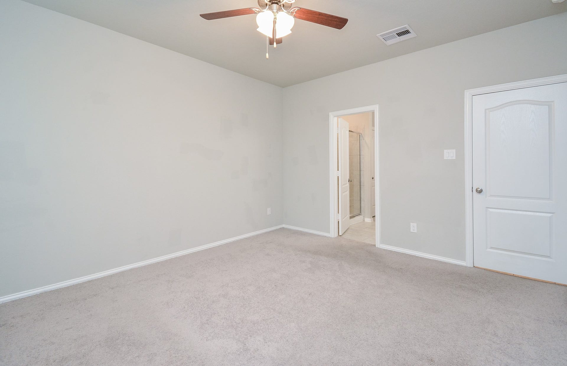 7450 French Quarter Court, Fulshear, TX 77441 This soothing place is your carpeted primary ensuite bedroom/bath.