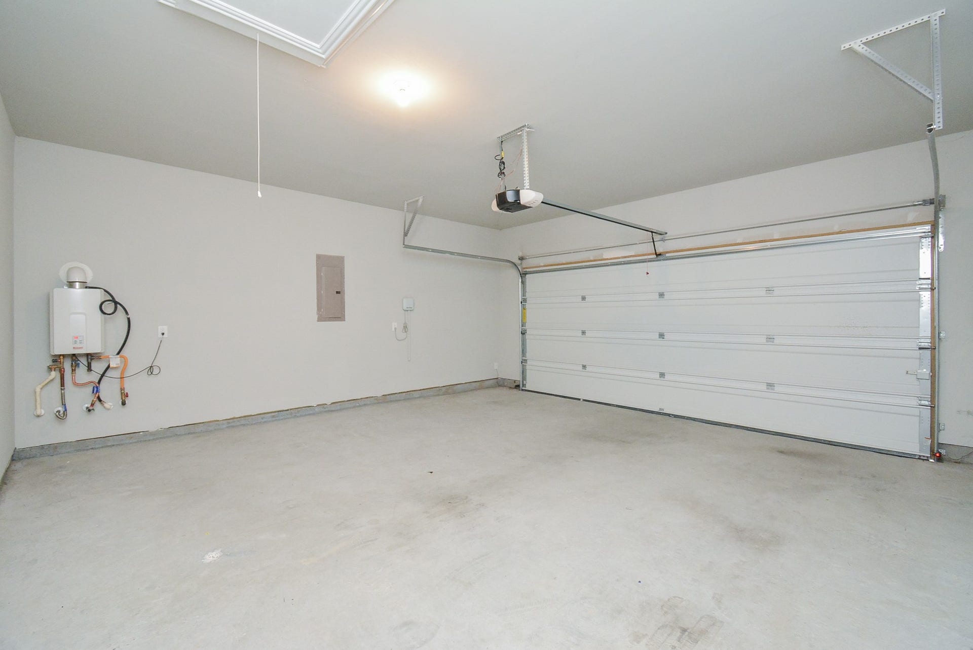 7450 French Quarter Court, Fulshear, TX 77441 Even the dual-vehicle attached garage is roomy and spotless.