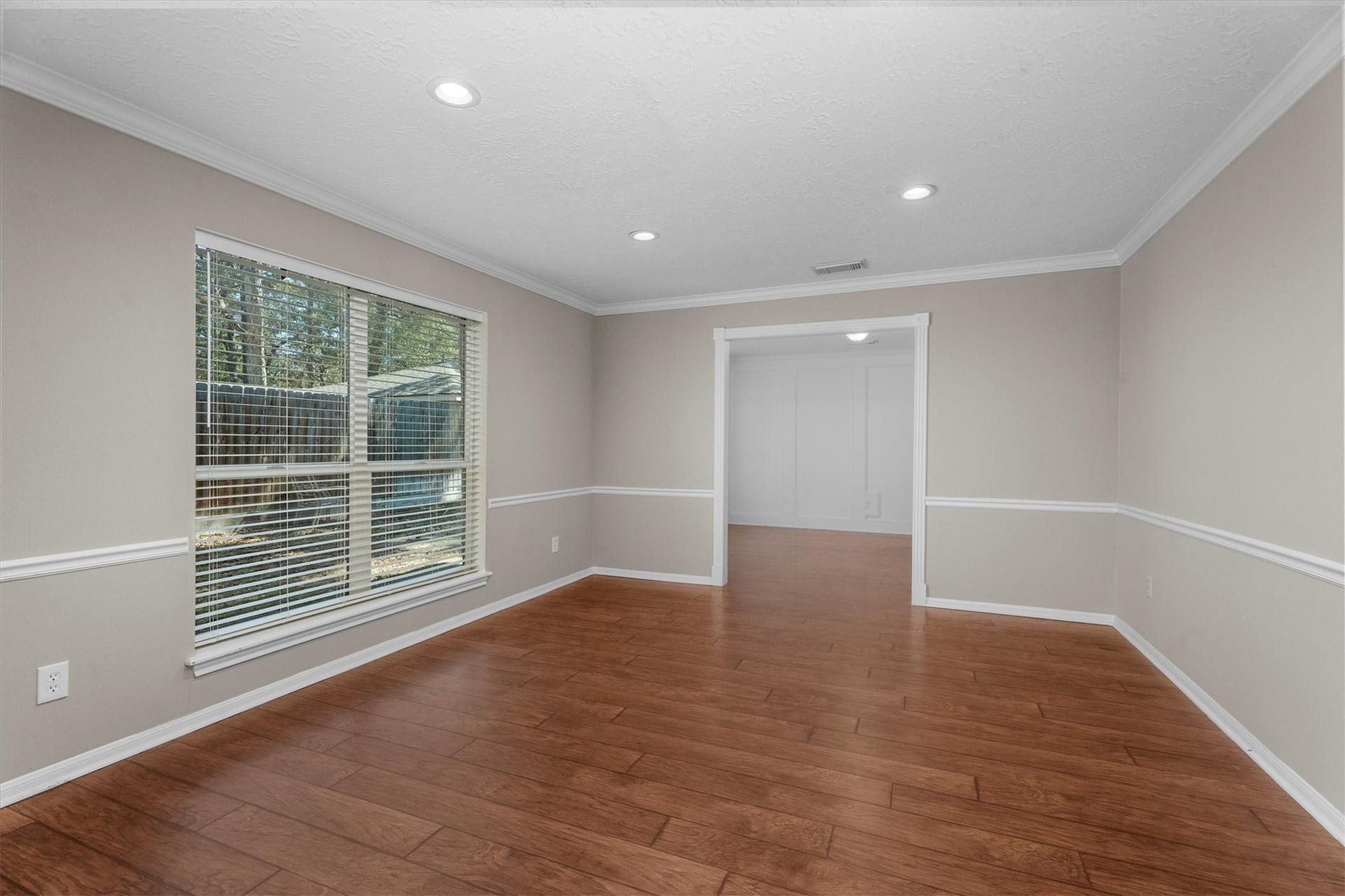 5939 Havenwoods Drive, Houston, TX 77066 light filled Living Room opening to Dining Room