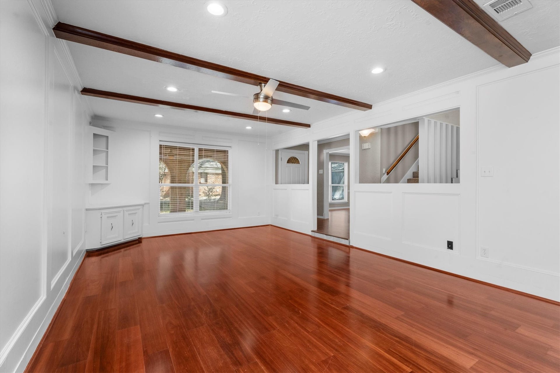 5939 Havenwoods Drive, Houston, TX 77066 Large Family Room w/ wood floors and accented by wood beams
