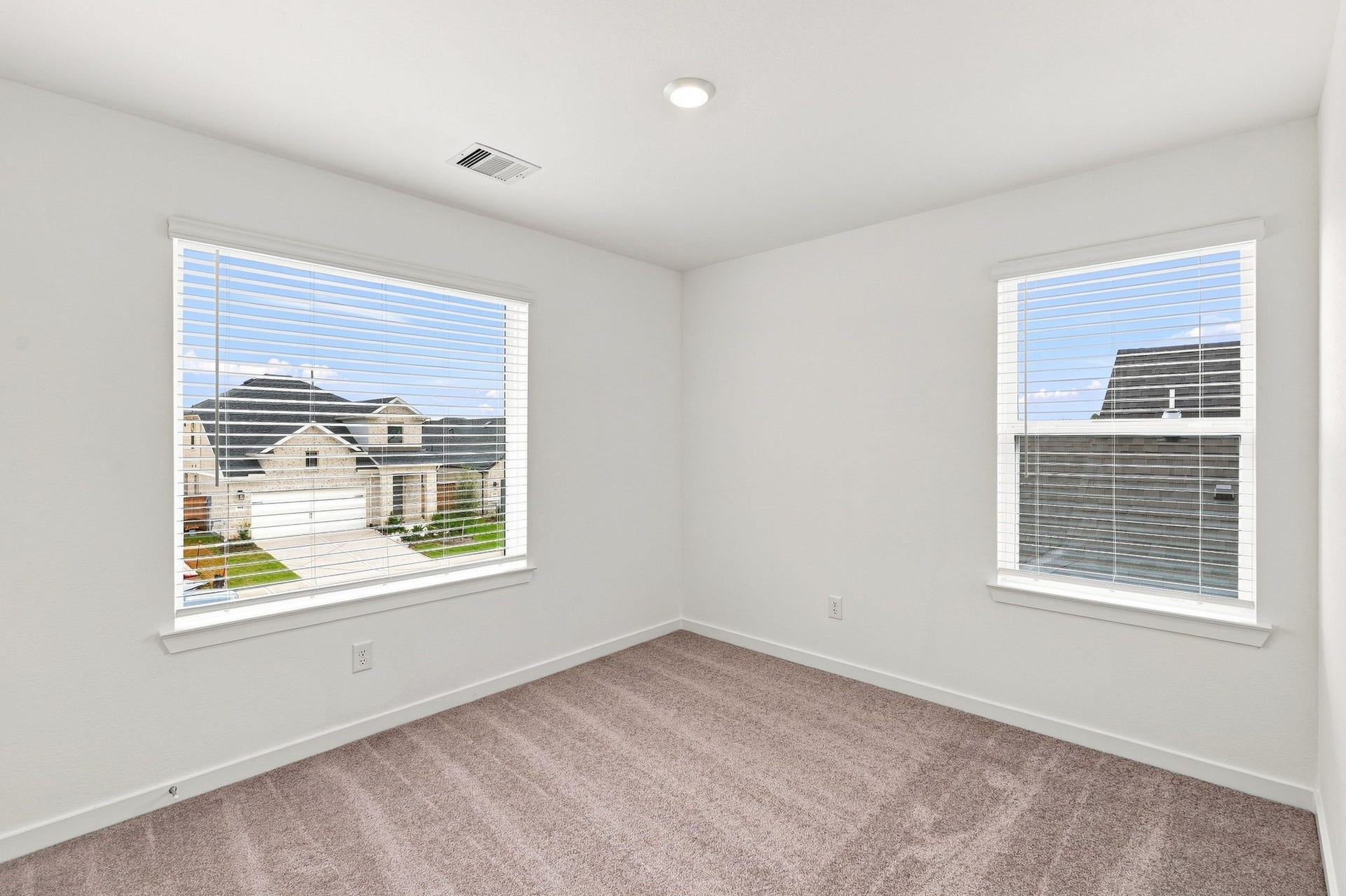 139 High Life Crossing, Richmond, TX 77469 Corner windows bring beautiful natural light into this inviting bedroom, creating a bright and comfortable space to make your own.
