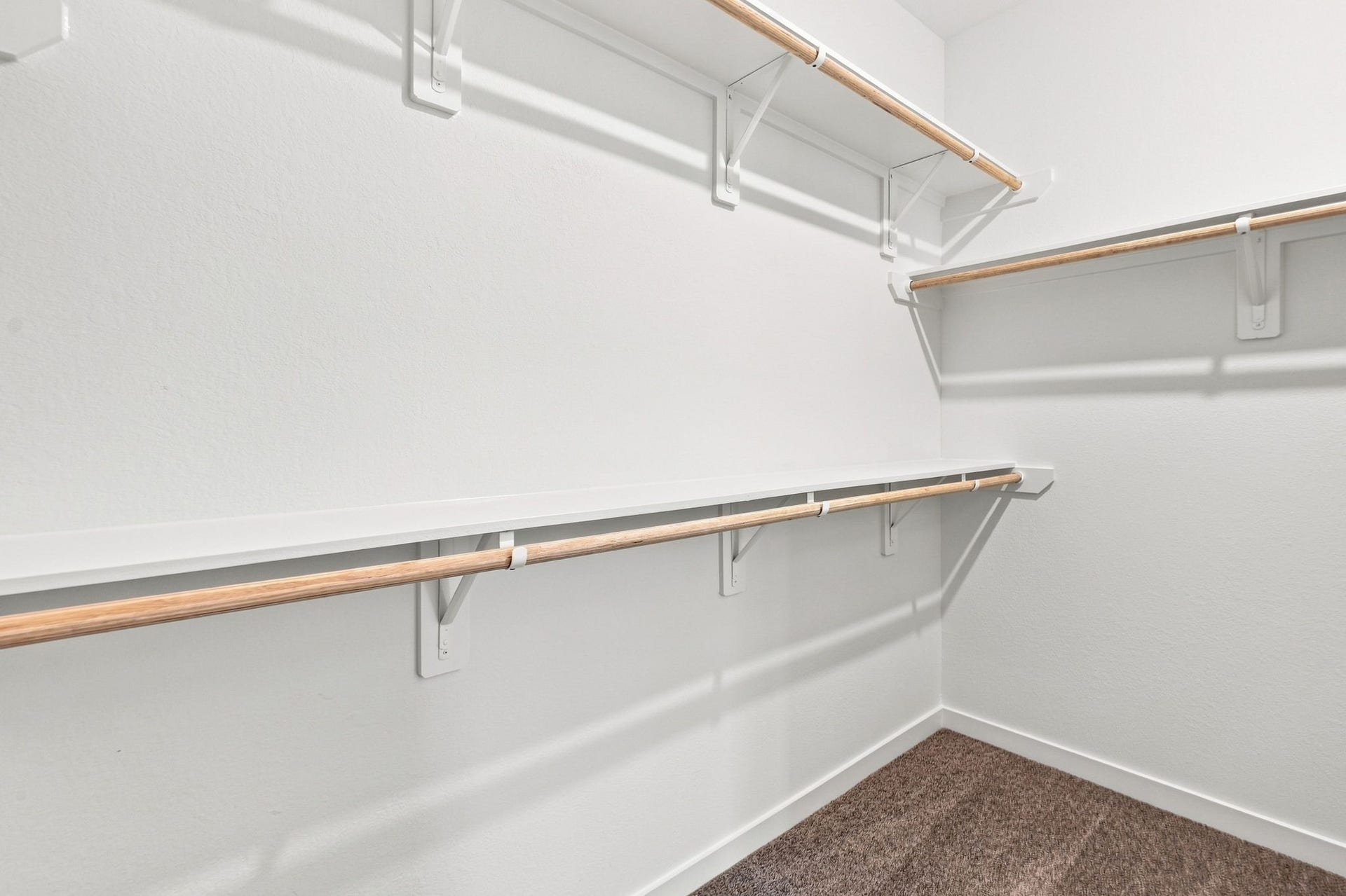 139 High Life Crossing, Richmond, TX 77469 A walk-in closet with built-in shelving and multiple hanging areas gives you a dedicated place for clothing, shoes, and accessorieskeeping everything organized and easy to find.