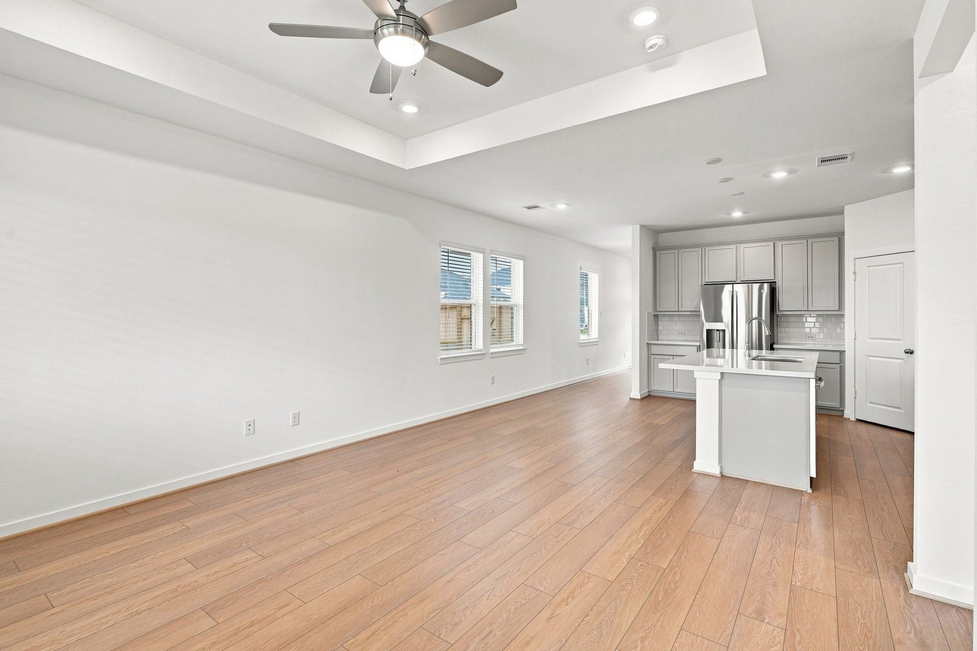 139 High Life Crossing, Richmond, TX 77469 Generously proportioned living space offers the flexibility to create your ideal gathering area, with an easy flow that makes both everyday living and entertaining feel effortless.