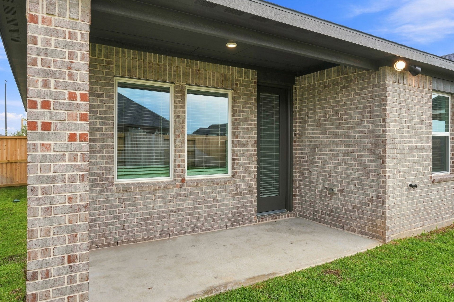 139 High Life Crossing, Richmond, TX 77469 Relax on the covered back patio, complete with recessed and accent lighting, offering the perfect shaded spot to unwind year-round