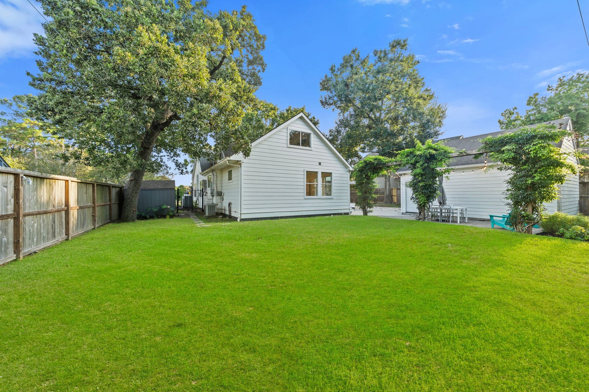 Deep, shaded backyard on the 11,820 sqft lot, with room for a pool.