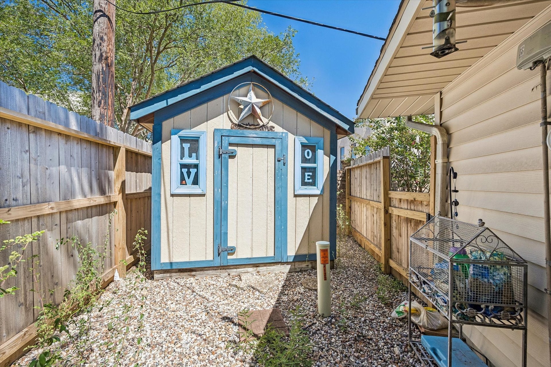 818 Olney Oak Drive, Houston, TX 77079 Custom built shed conveys - located behind the garage with side yard space