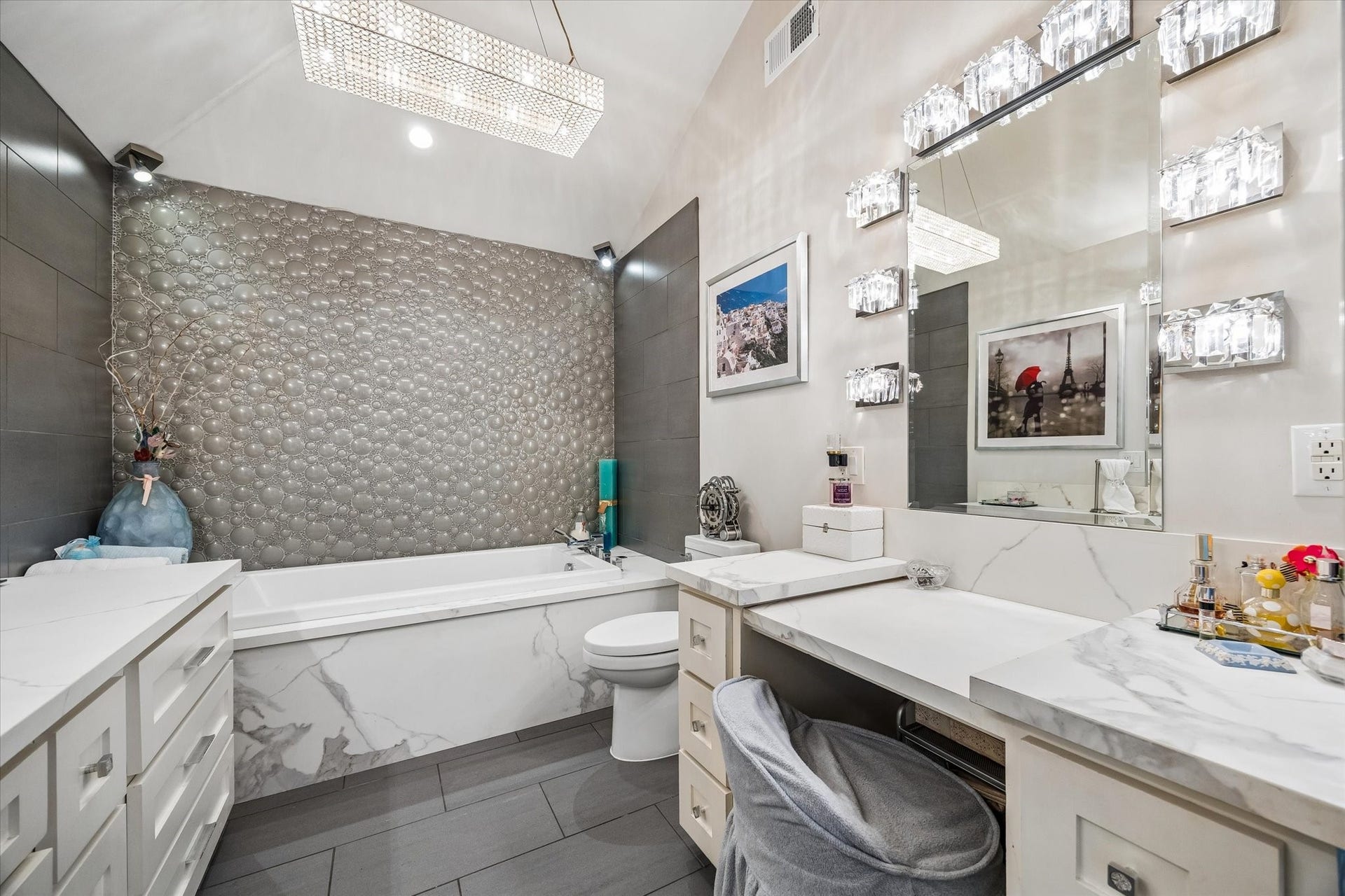 818 Olney Oak Drive, Houston, TX 77079 Meticulously updated primary bathroom! *not pictured - outlets for styling accessories in 2vanity drawers
