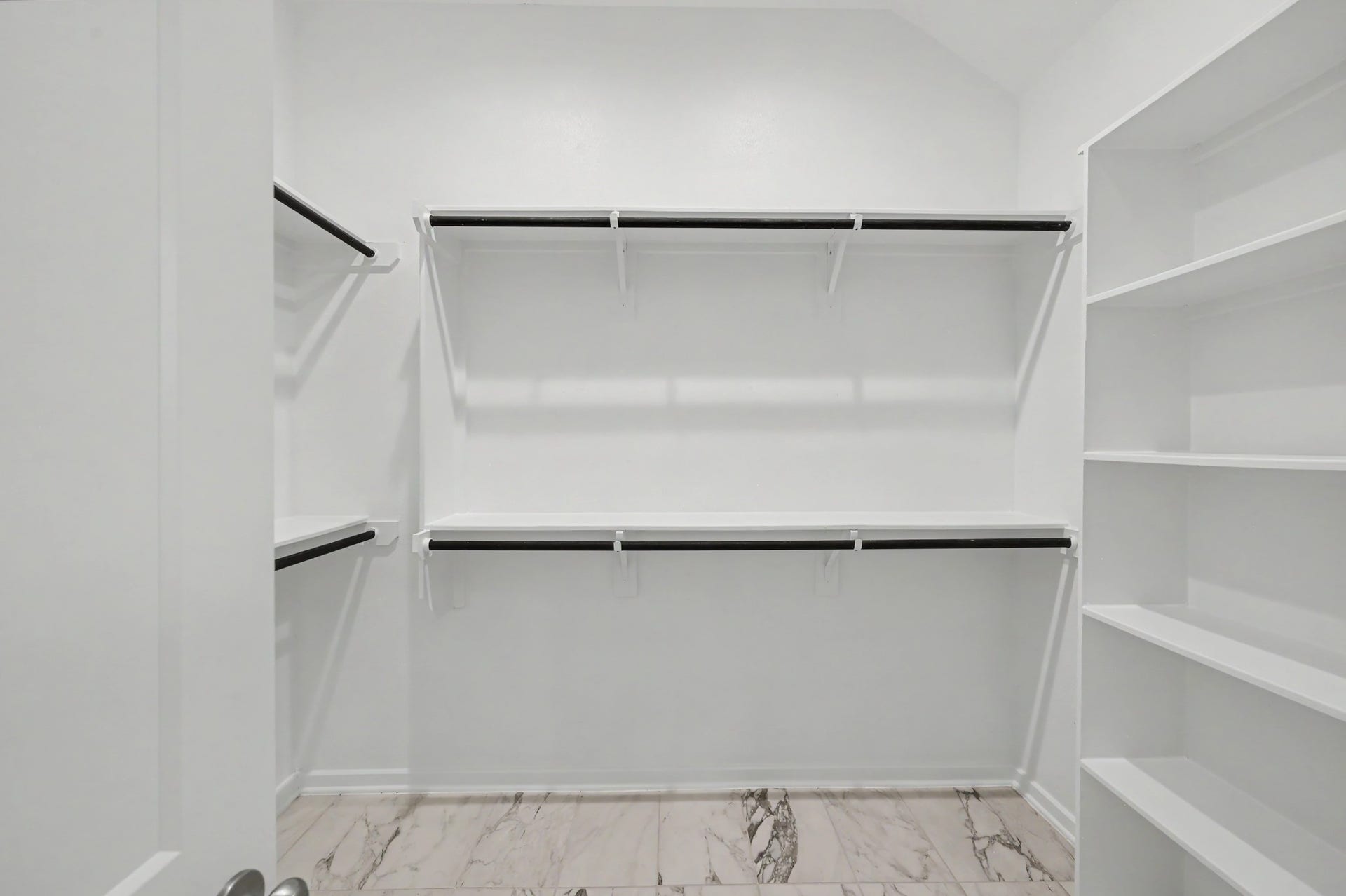 Primary closet offers plenty of space