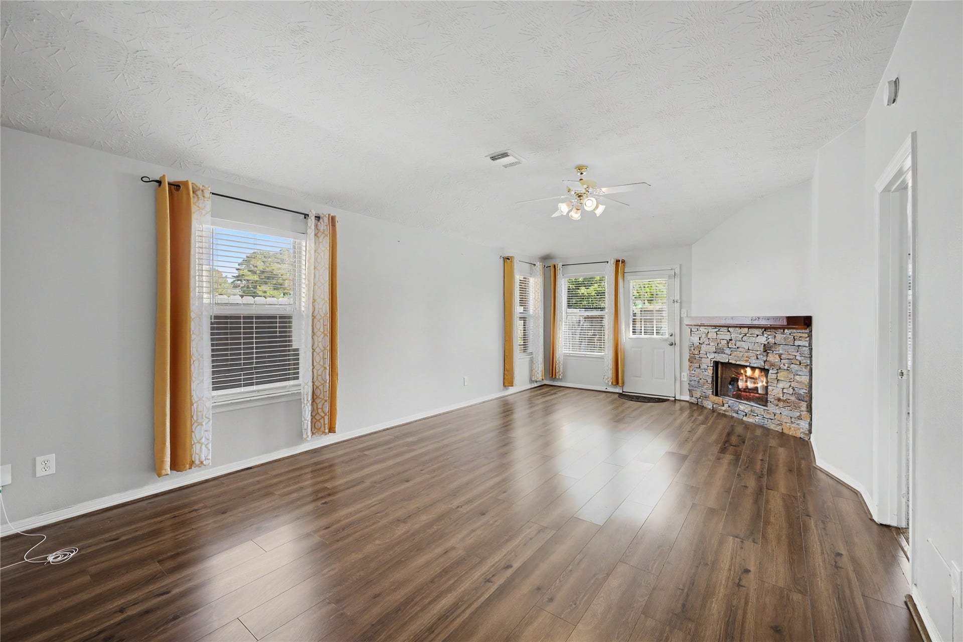 2506 Montana Blue Drive, Spring, TX 77373 Living room with fireplace