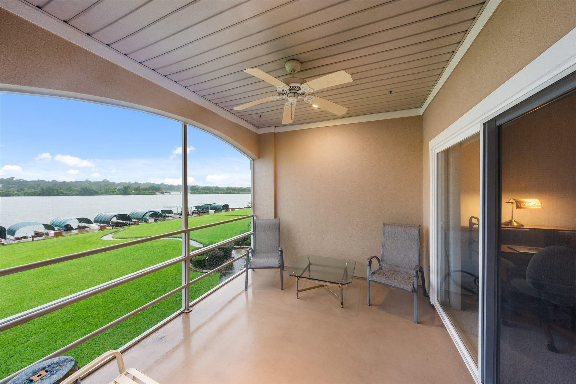 Slip out to the balcony from your primary suite and enjoy a cup of coffee and the peaceful view.