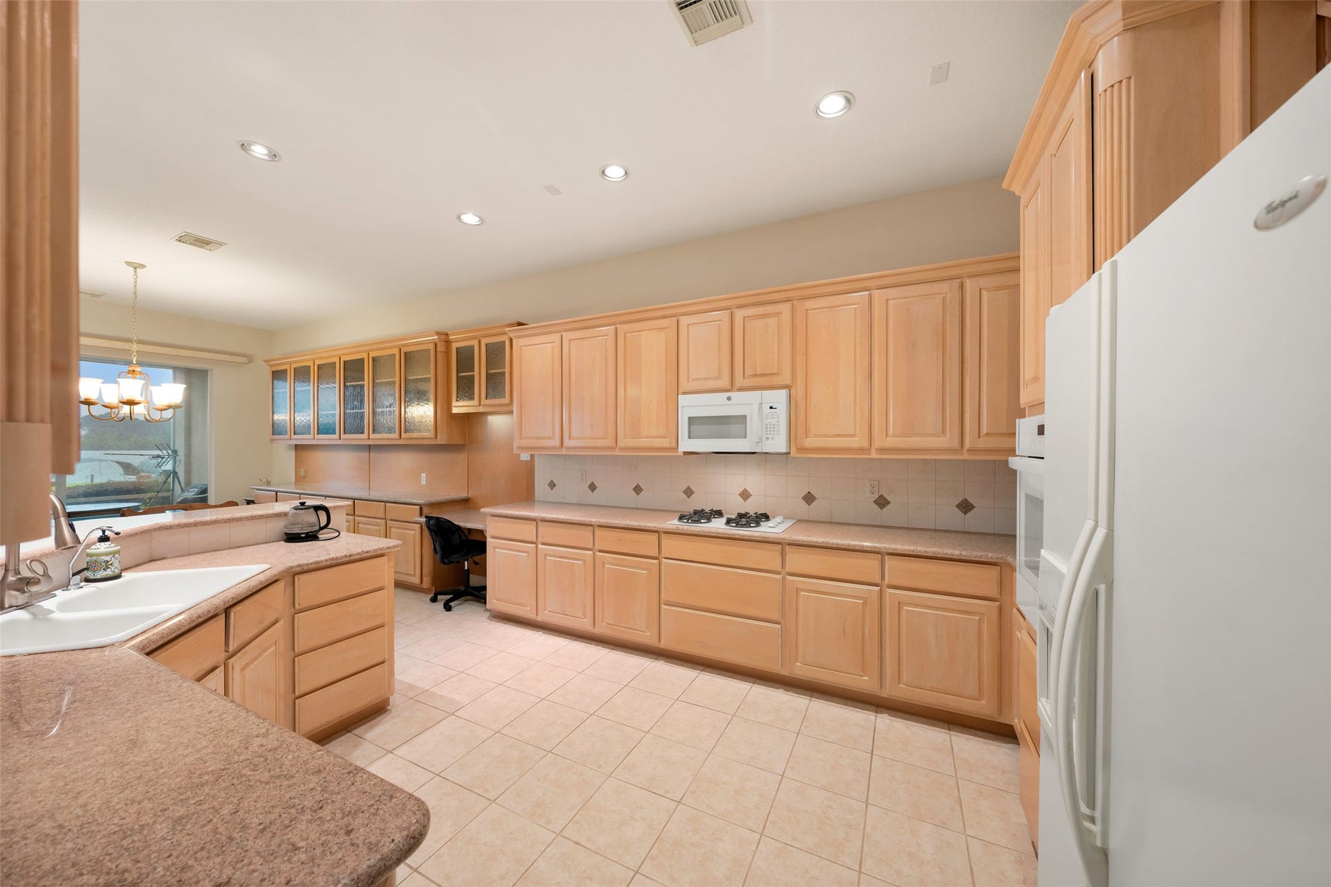 Plenty of cabinet space in this kitchen.