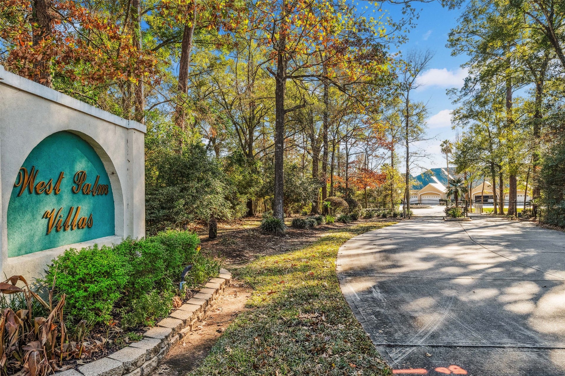 West Palm Villas is a small private gated enclave hidden behind the trees.