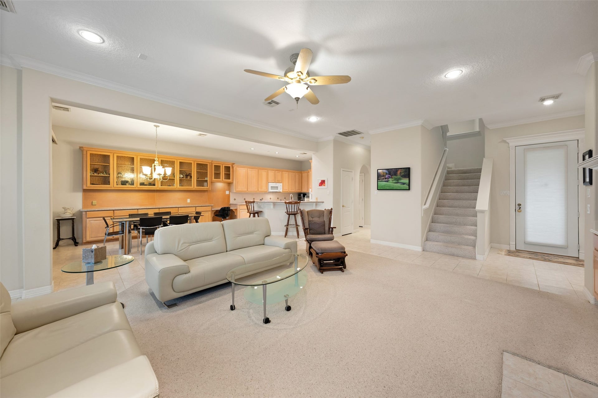 Living area opens directly into the dining room and kitchen. Perfect for enteratining!