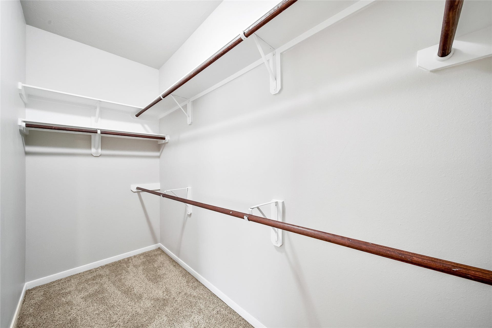 25604 Southwood Oaks Court, Porter, TX 77365 The primary bedroom has a huge closet for all your wardrobe needs.