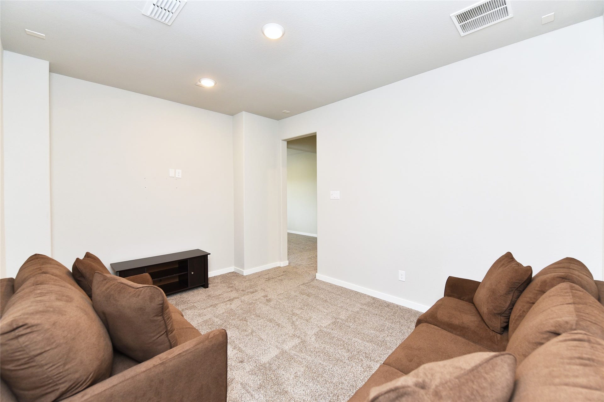 The media room is upstairs and is wired for surround sound.