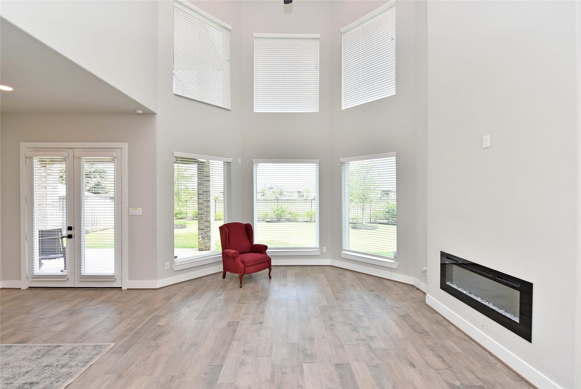 From the entry, the fabulous views beckon you in.  Note the windows wrapping the room in natural light.