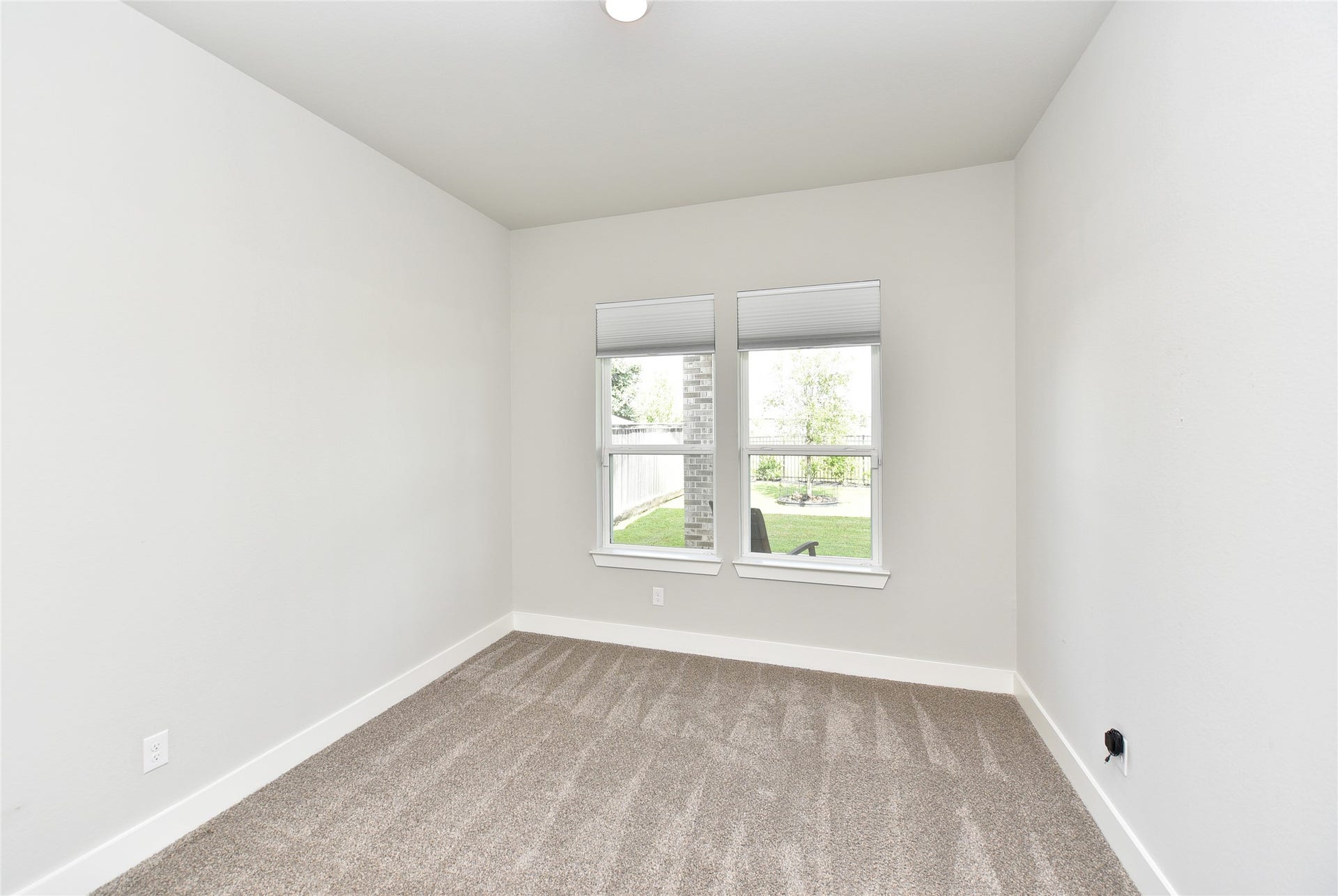 The second bedroom downstairs.